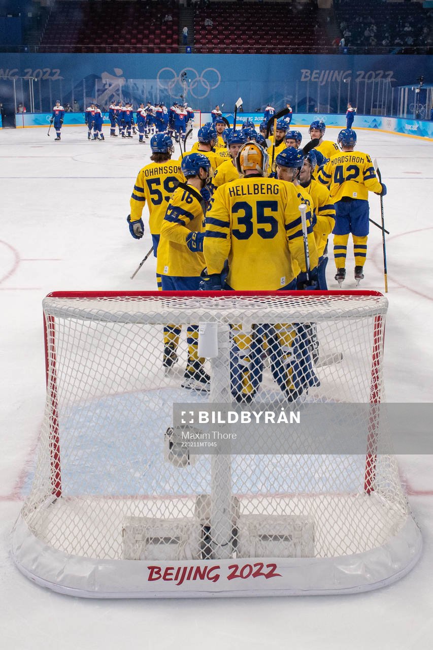Goaltender Magnus Hellberg of Sweden celebrate with