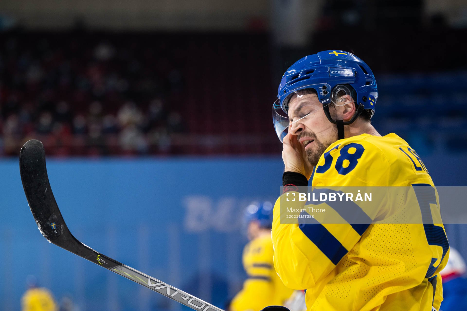 Anton Lander of Sweden looks dejected in an ice hockey
