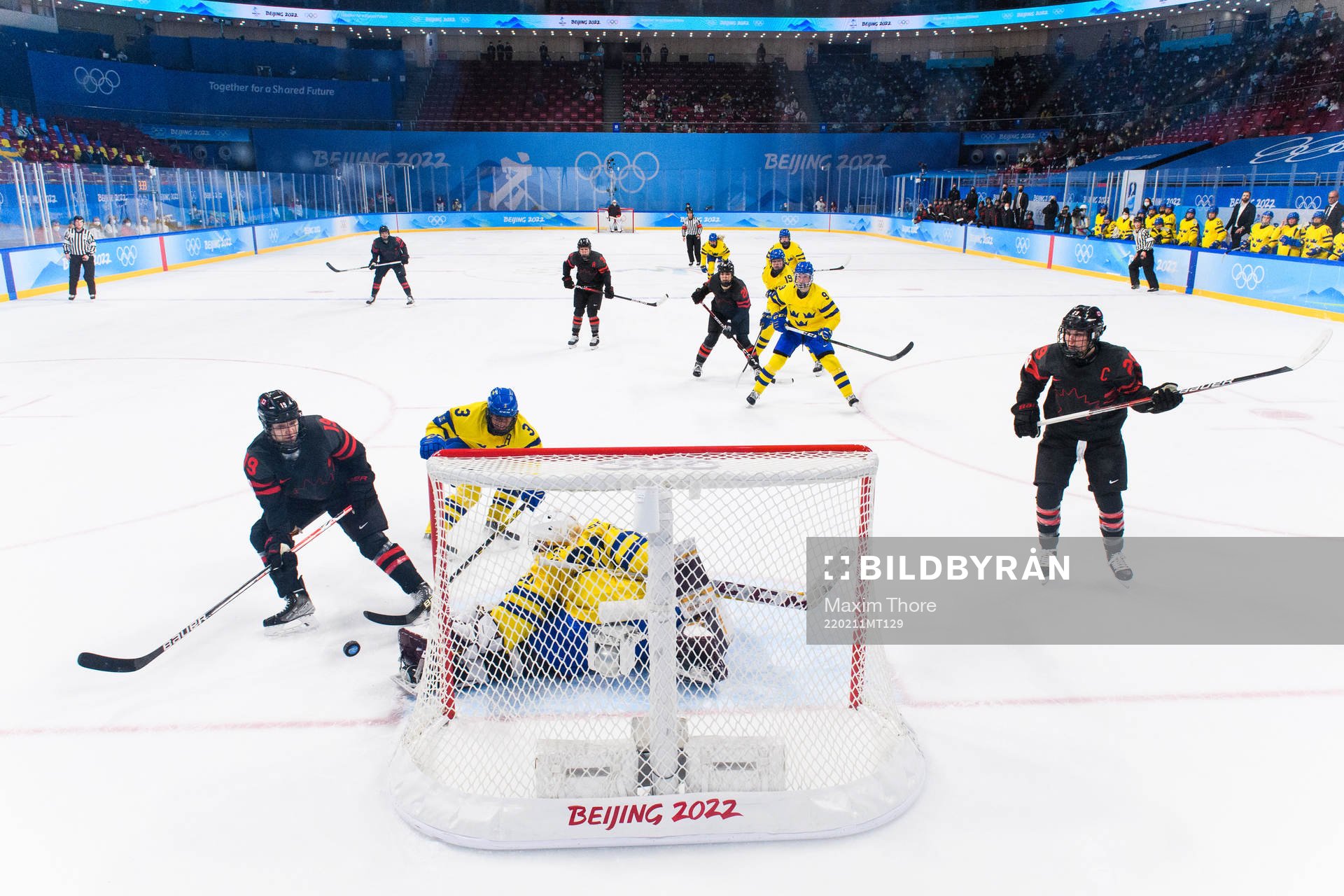 Brianne Jenner of Canada, Anna Kjellbin and goaltender Emma