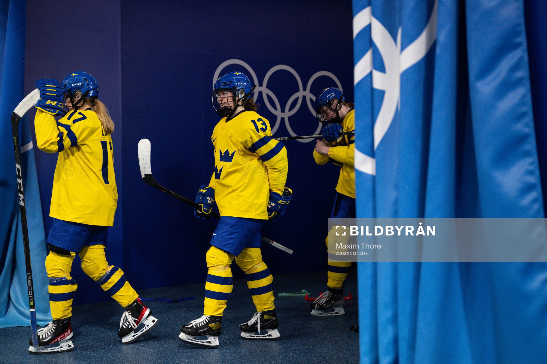 Sofie Lundin and Emma Murén of Sweden in an ice hockey