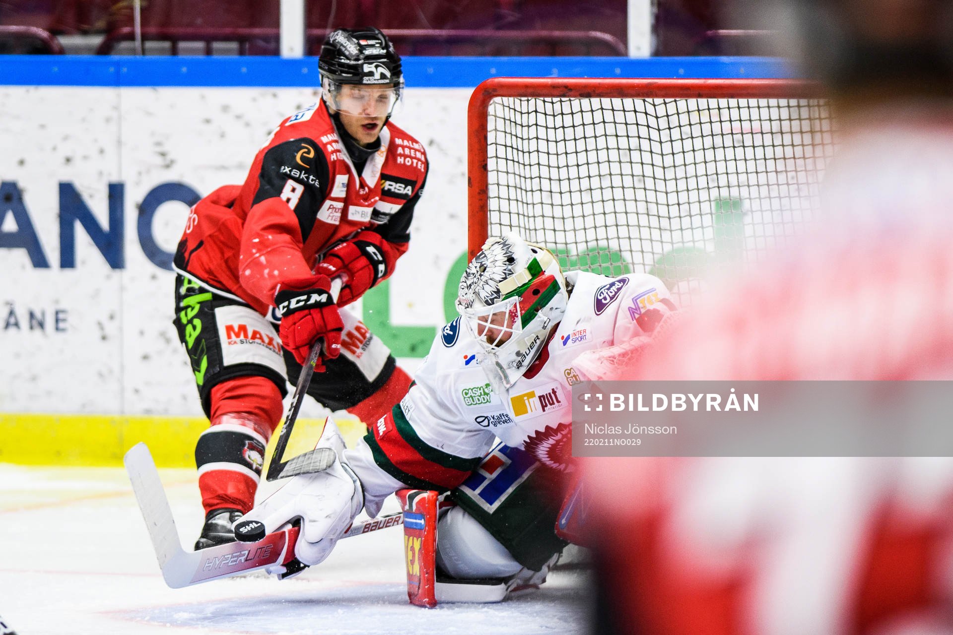 Malmö Redhawks Johan Olofsson och Frölundas målvakt