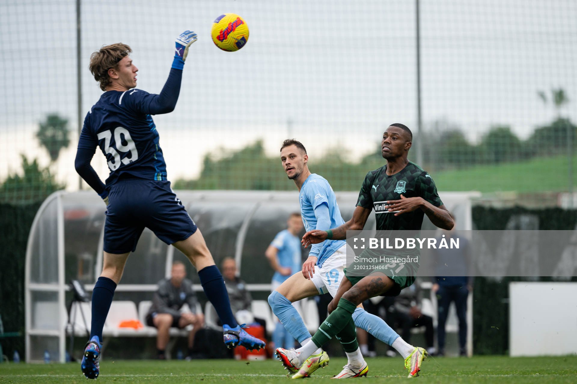Veljko Birmancevic of Malmö FF against goalkeeper Matvey