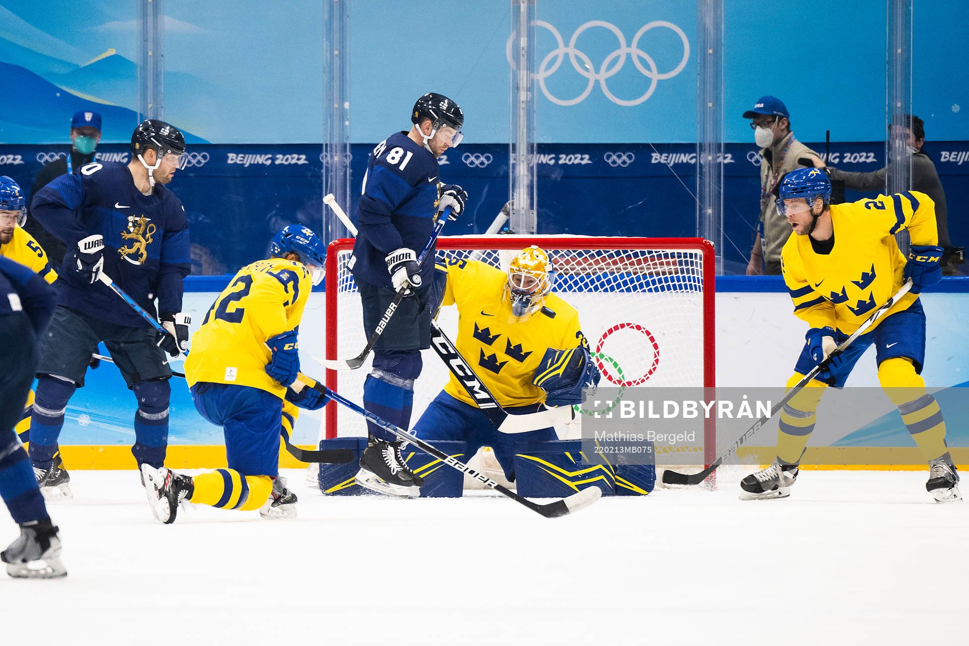 Iiro Pakarinen of Finland and goaltender Magnus Hellberg of