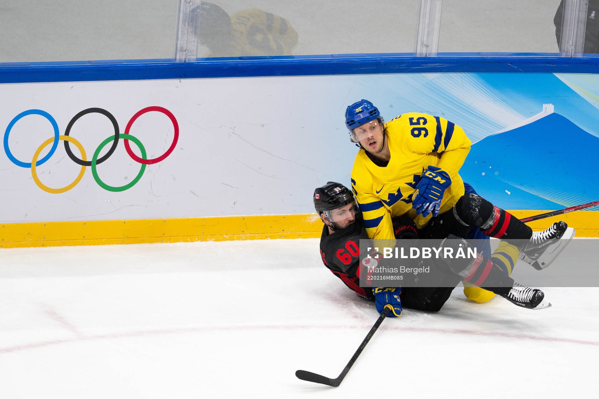 Jacob de la Rose of Sweden and Jason Demers of Canada in