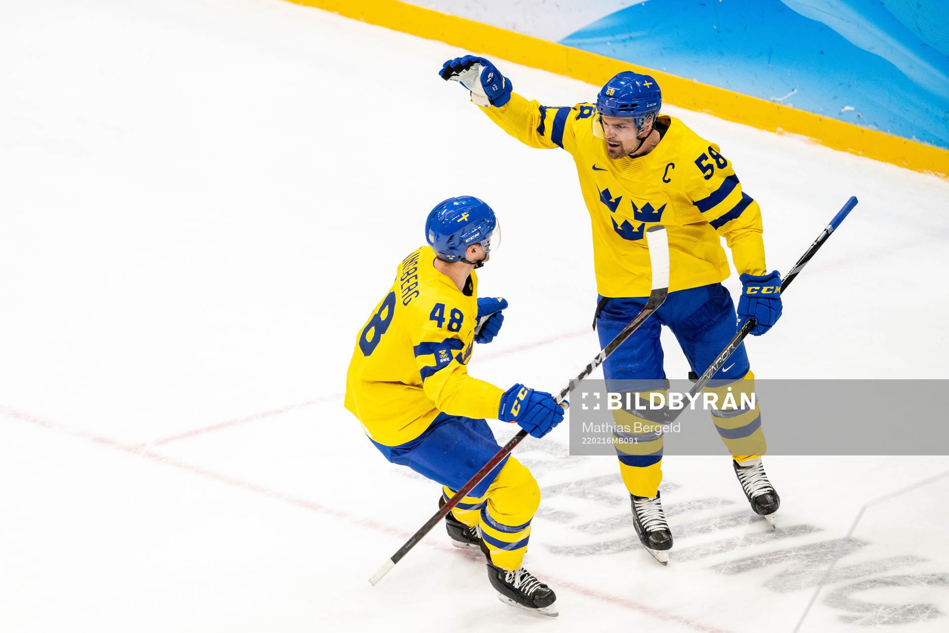 Carl Klingberg and Anton Lander of Sweden celebrate the 2-0