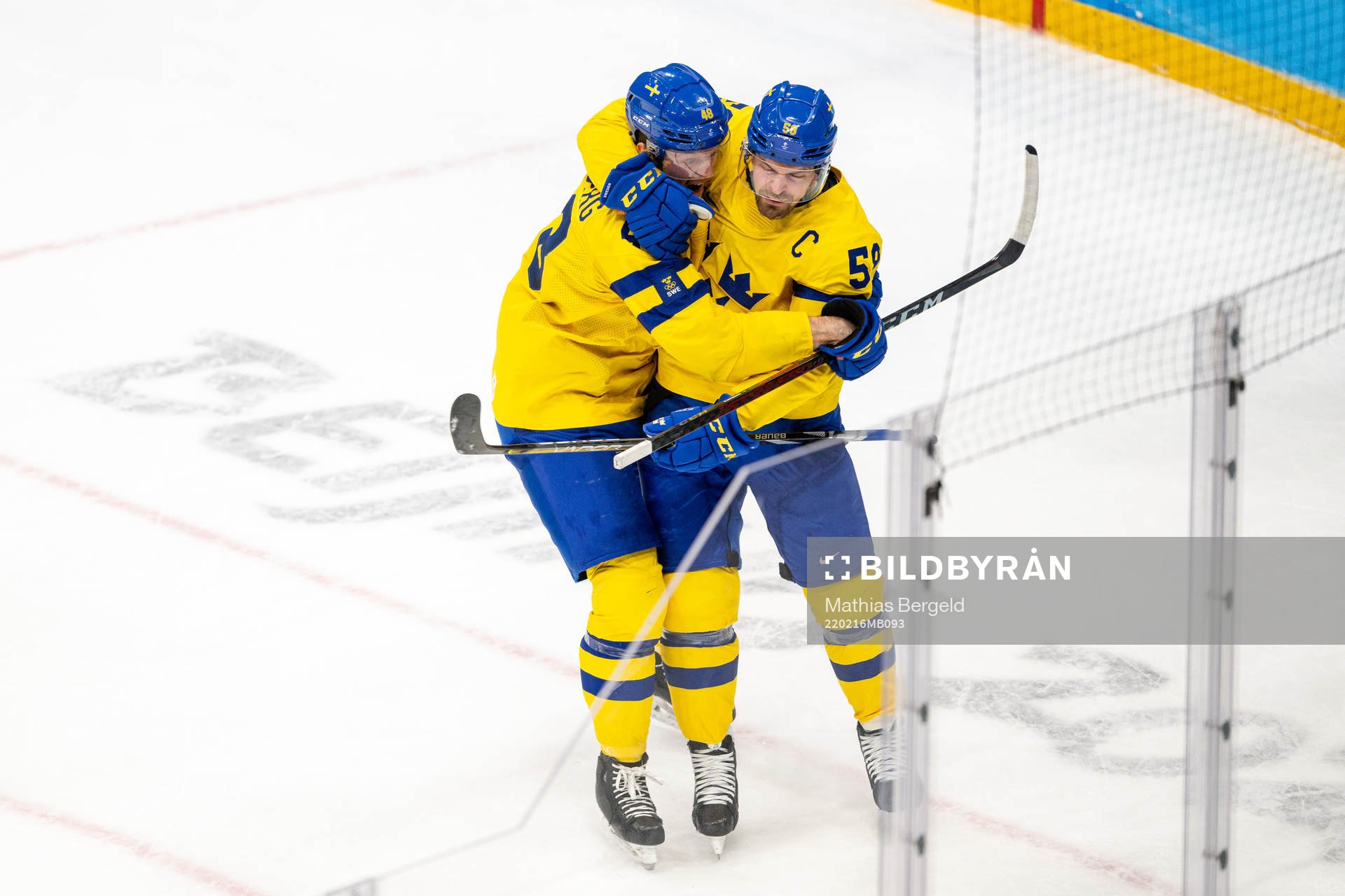 Carl Klingberg and Anton Lander of Sweden celebrate the 2-0