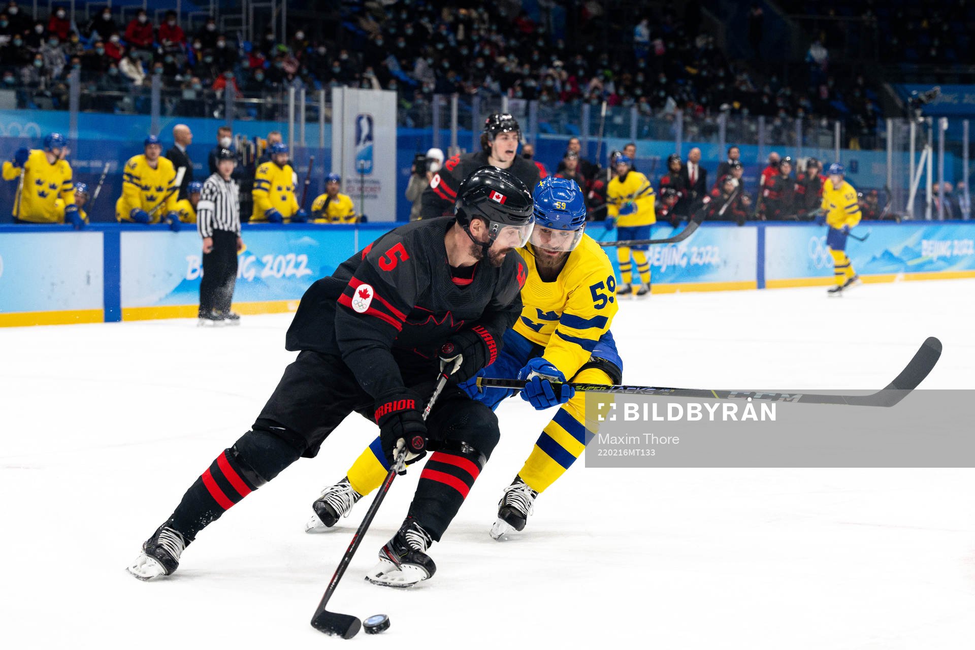 Morgan Ellis of Canada and Linus Johansson of Sweden in the
