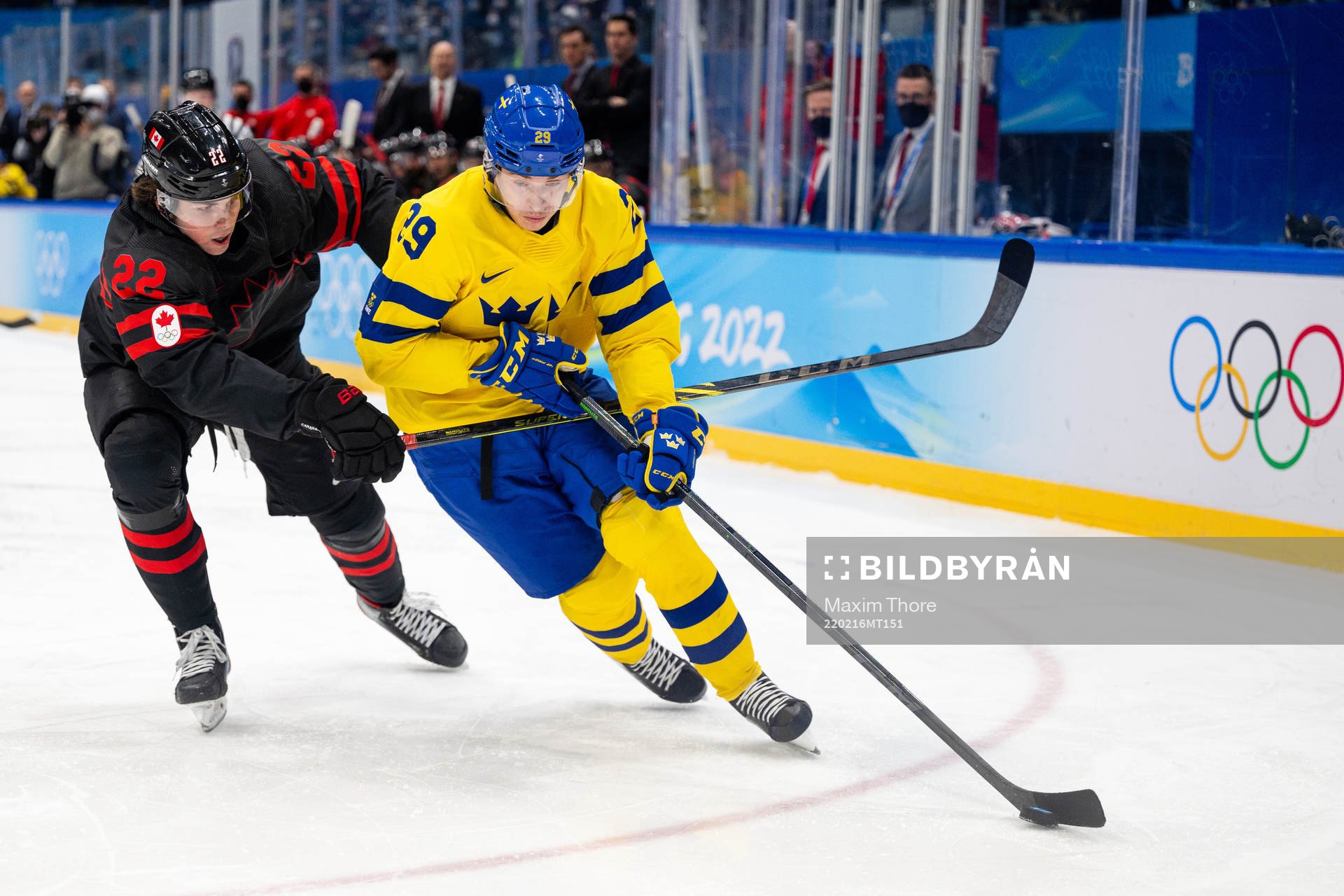 Owen Power of Canada and Pontus Holmberg of Sweden in the