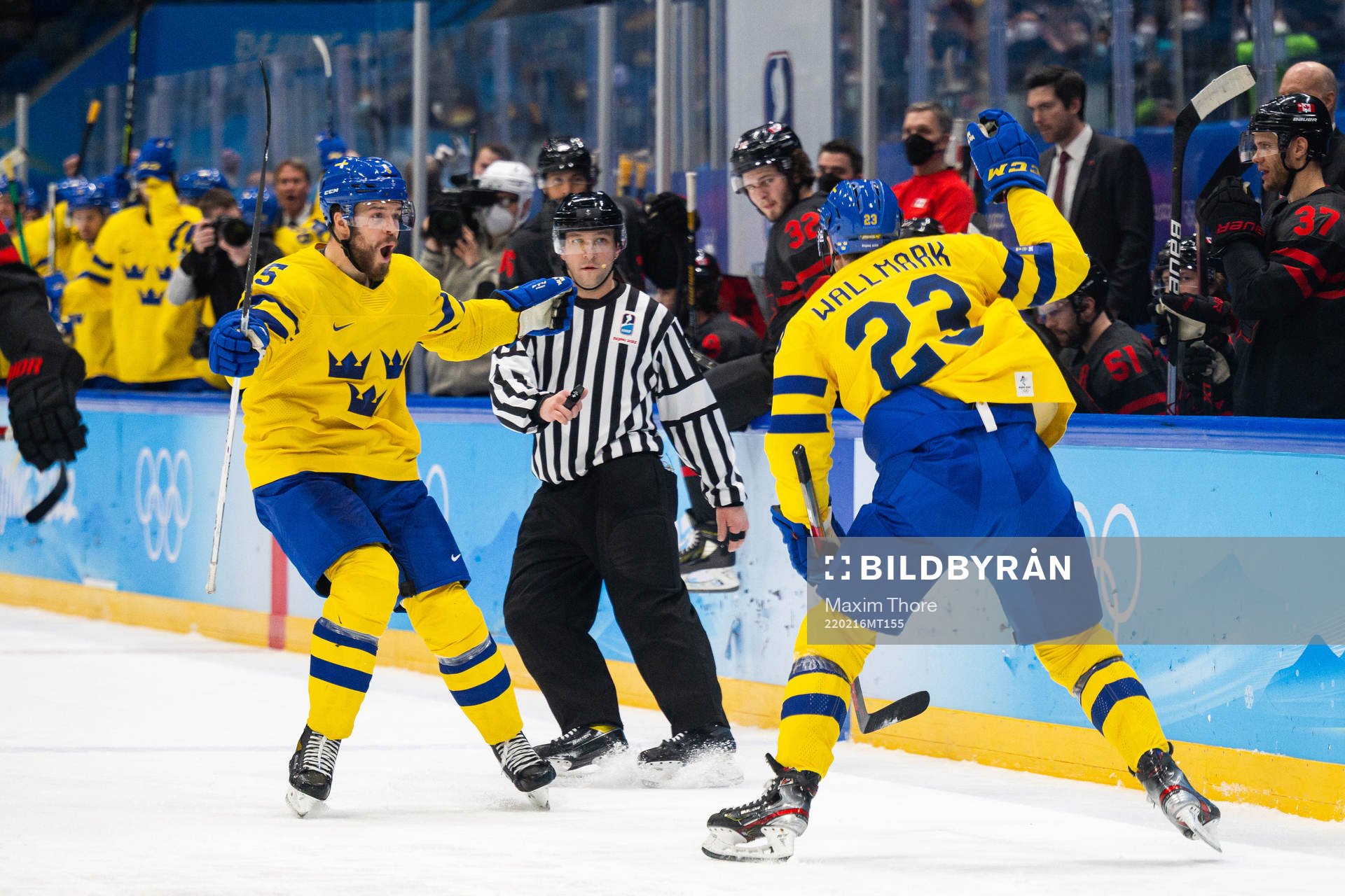 Oscar Fantenberg and Lucas Wallmark of Sweden celebrate the