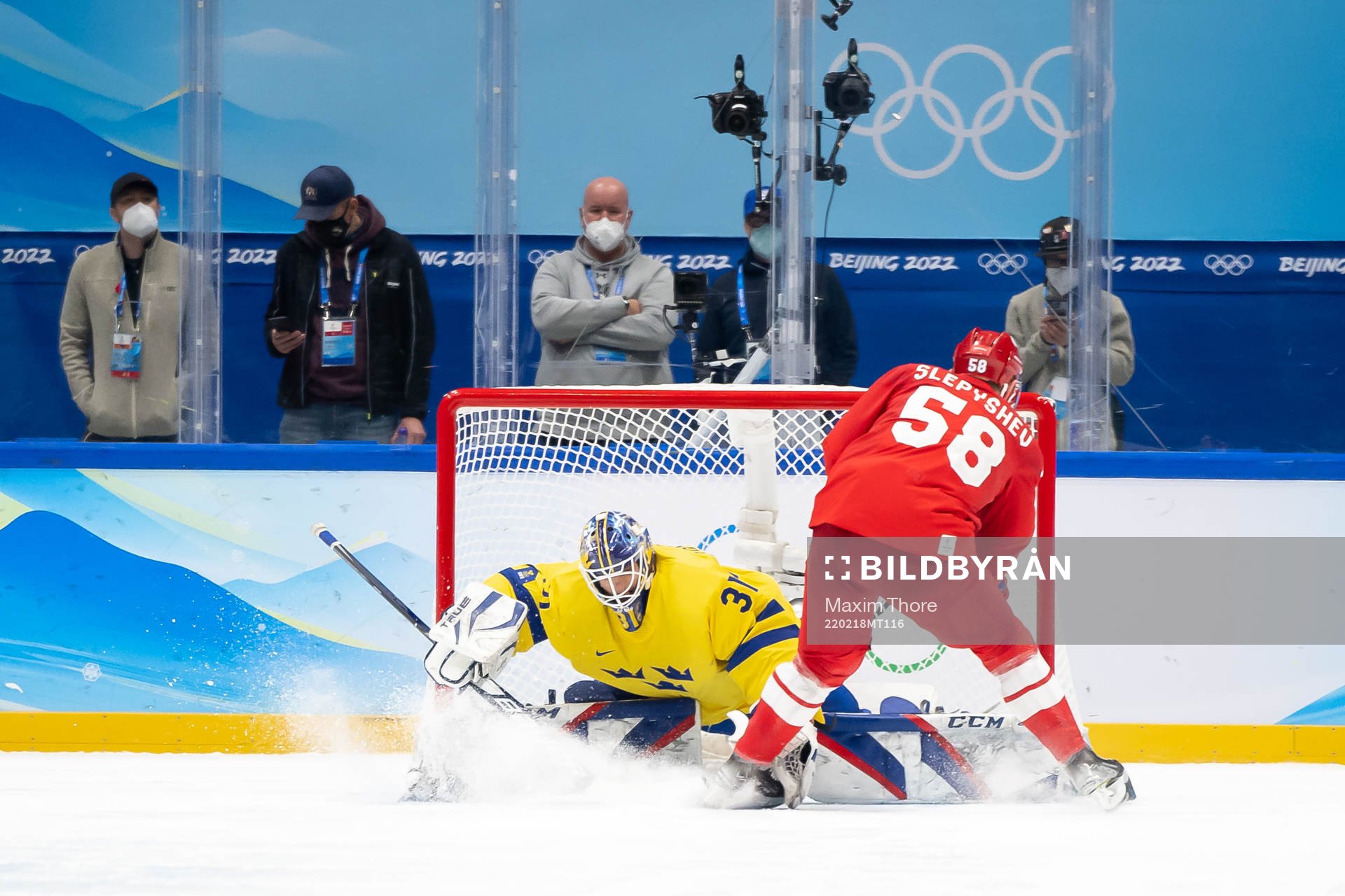 Goaltender Lars Johansson of Sweden with a save from Anton