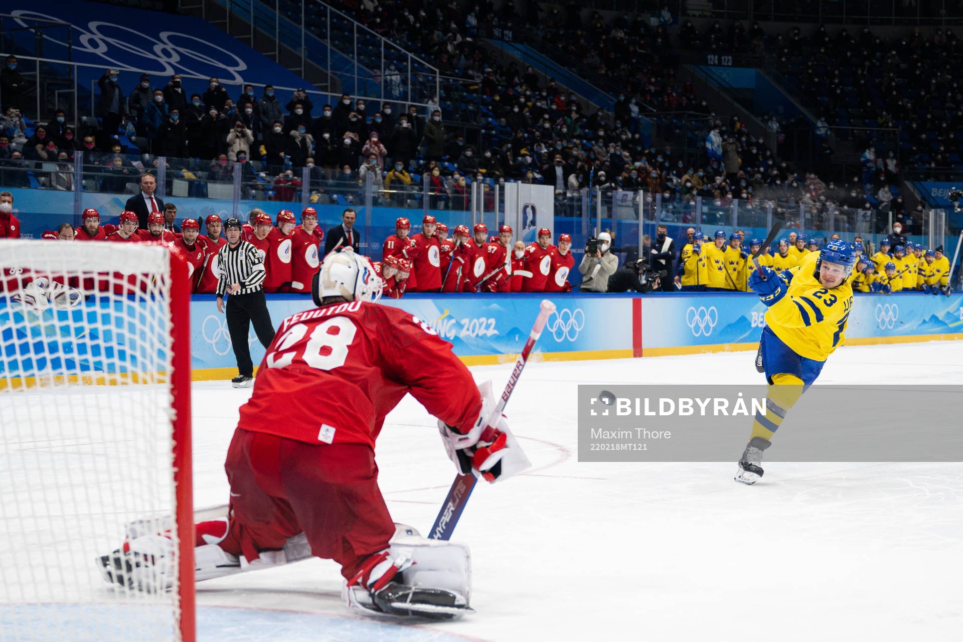 Goaltender Ivan Fedotov of Russia and Lucas Wallmark of