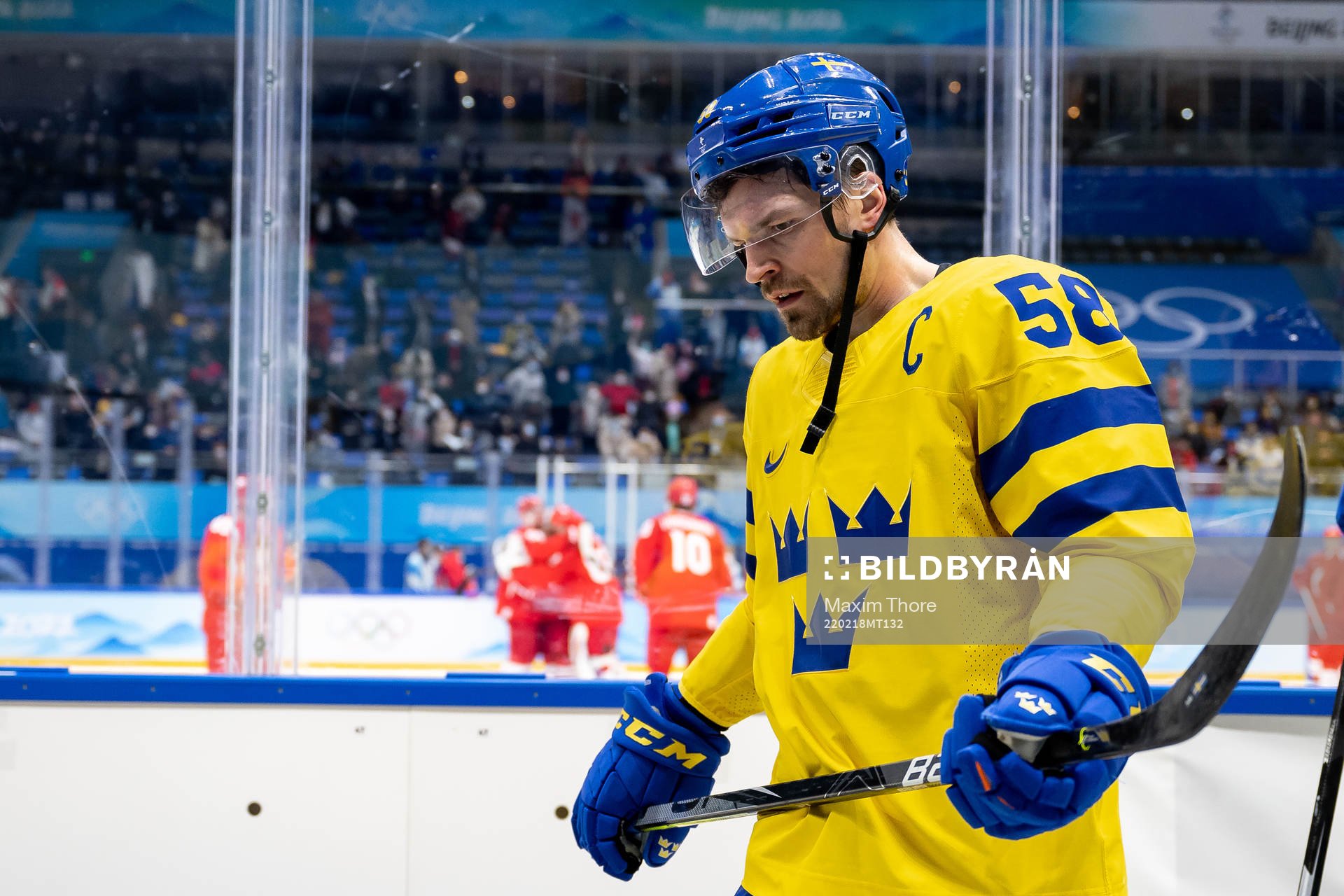 Anton Lander of Sweden looks dejected
