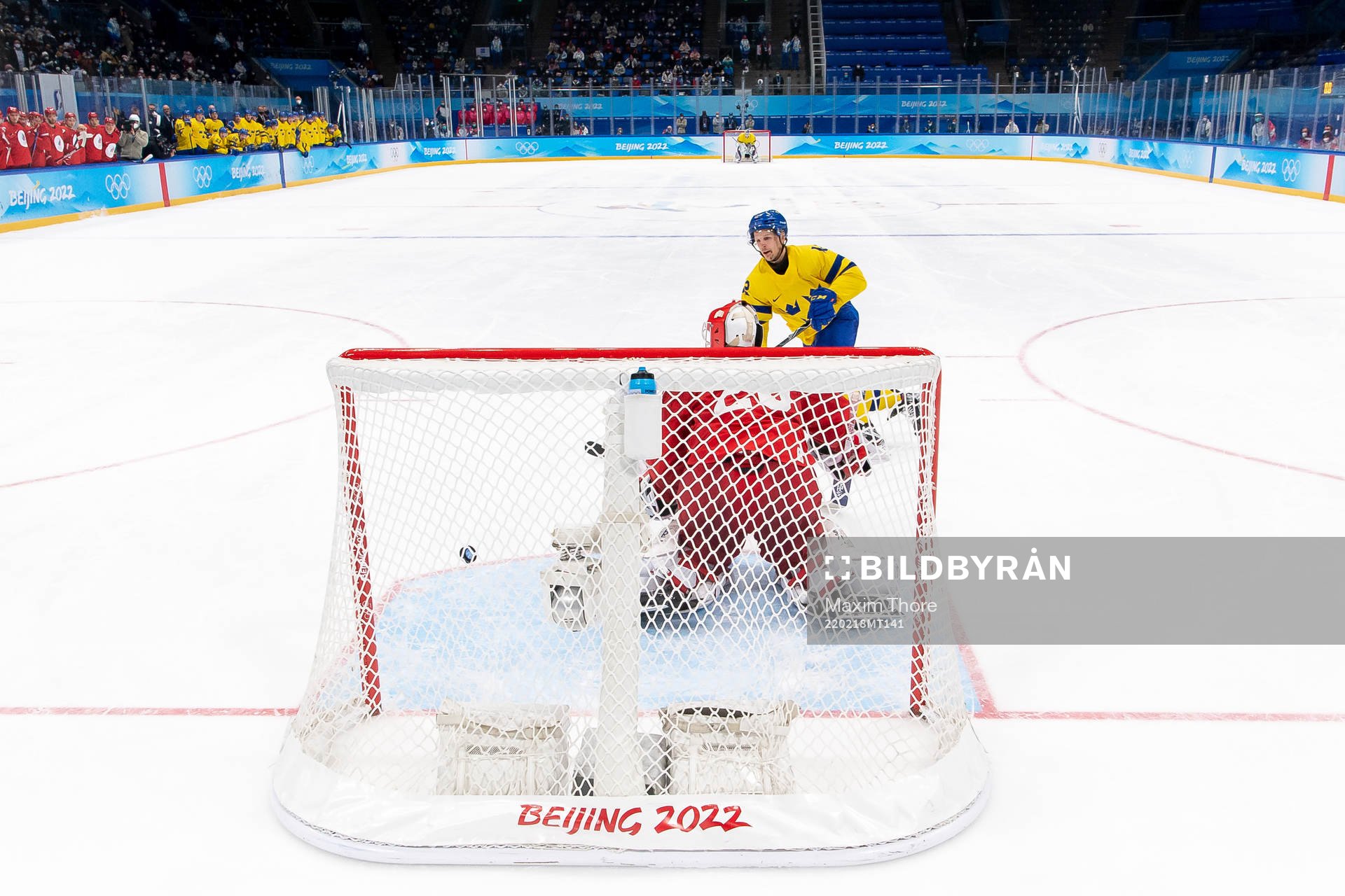 Max Friberg of Sweden against goaltender Ivan Fedotov of
