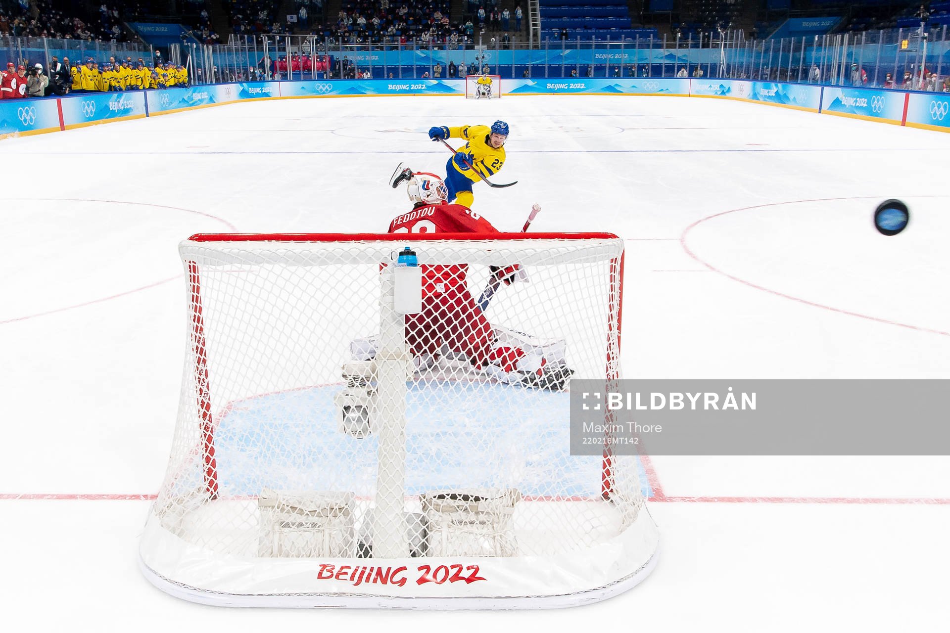 Lucas Wallmark of Sweden against goaltender Ivan Fedotov of