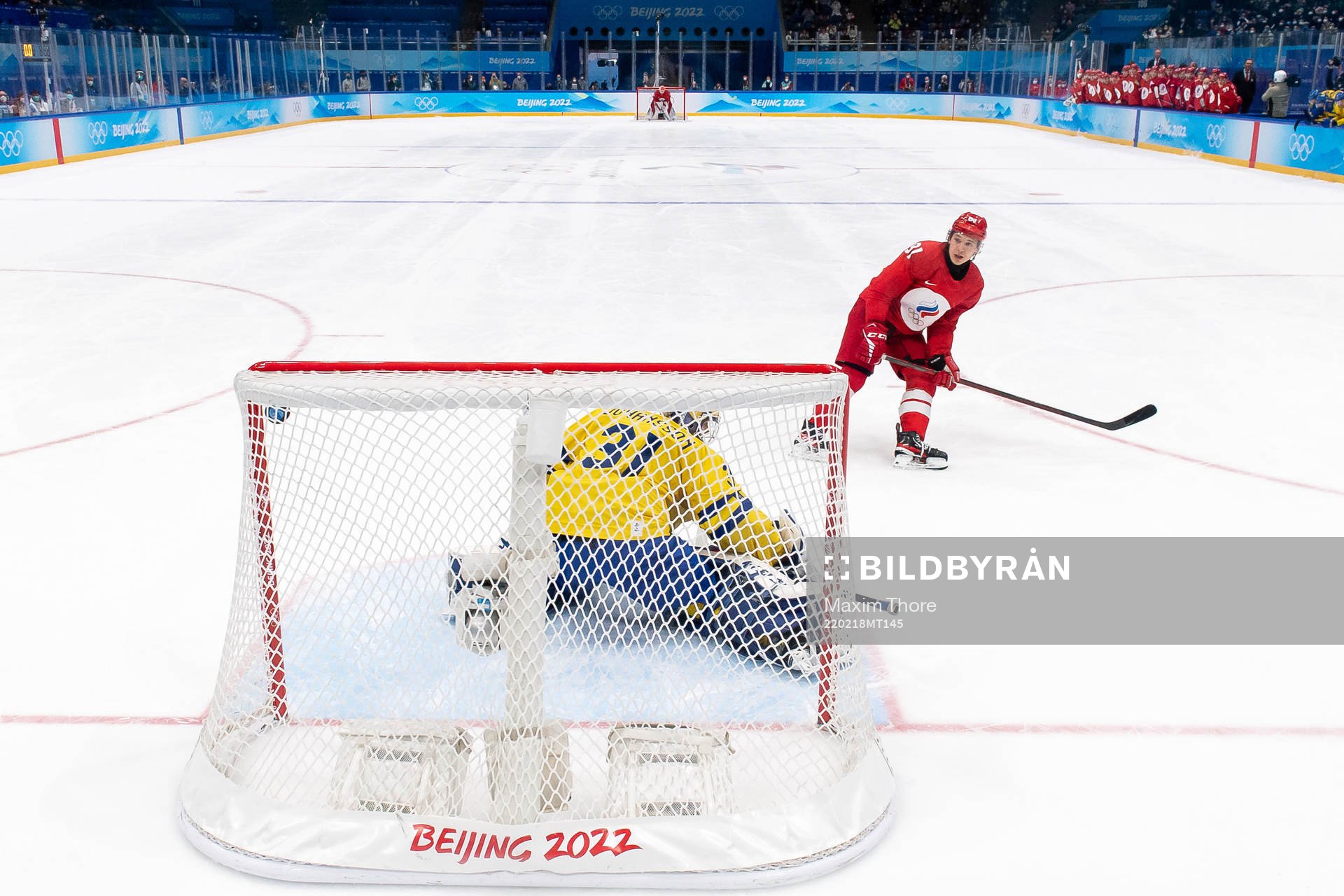 Arseni Gritsyuk of Russia against goaltender Lars Johansson