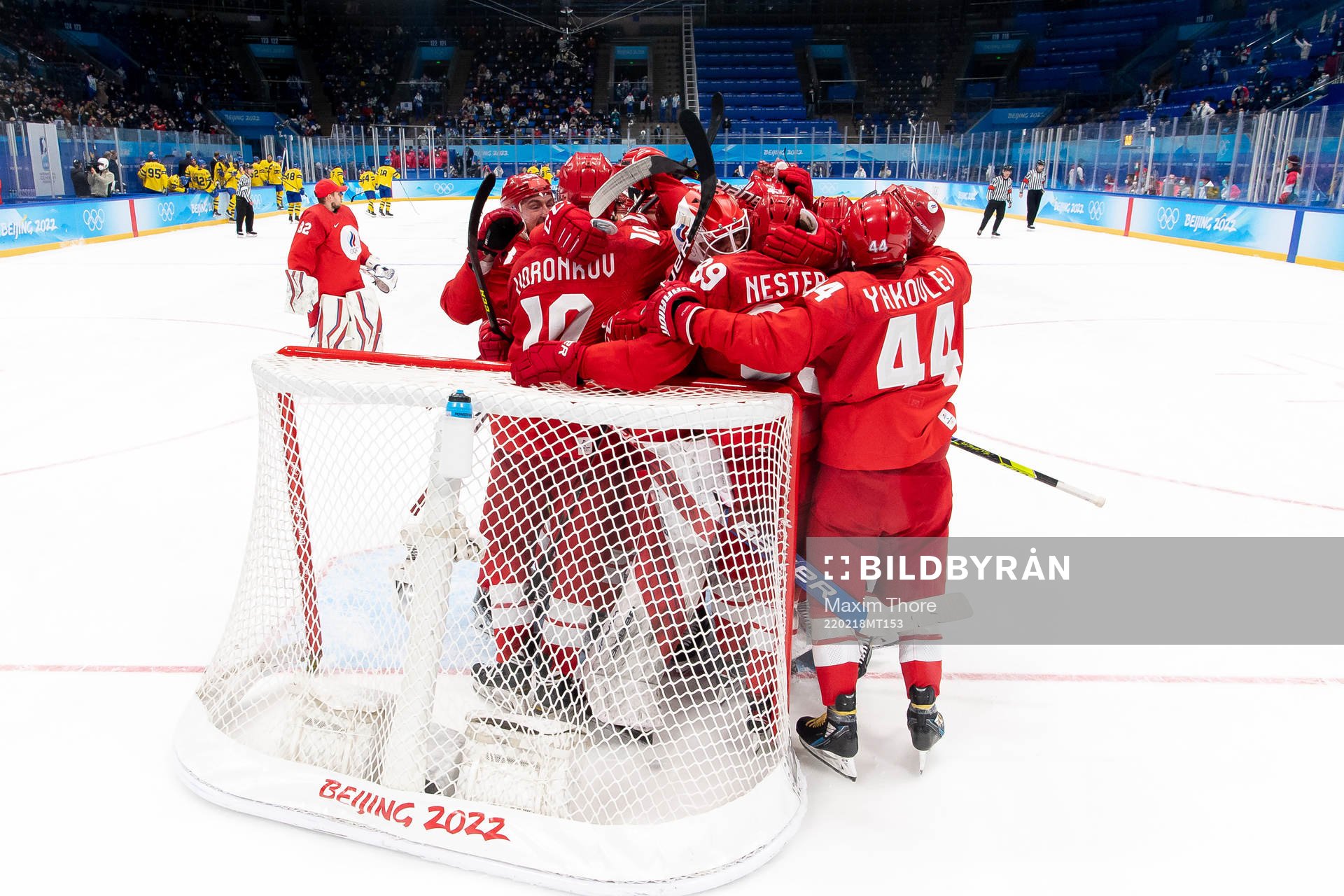 Goaltender Ivan Fedotov of Russia celebrates with teammates