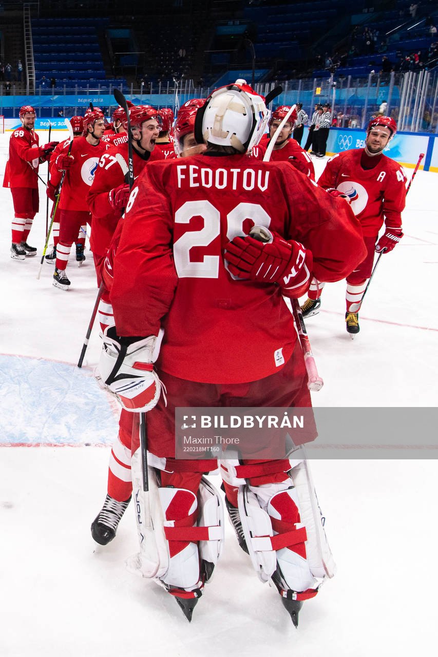 Goaltender Ivan Fedotov of Russia celebrate with teammates