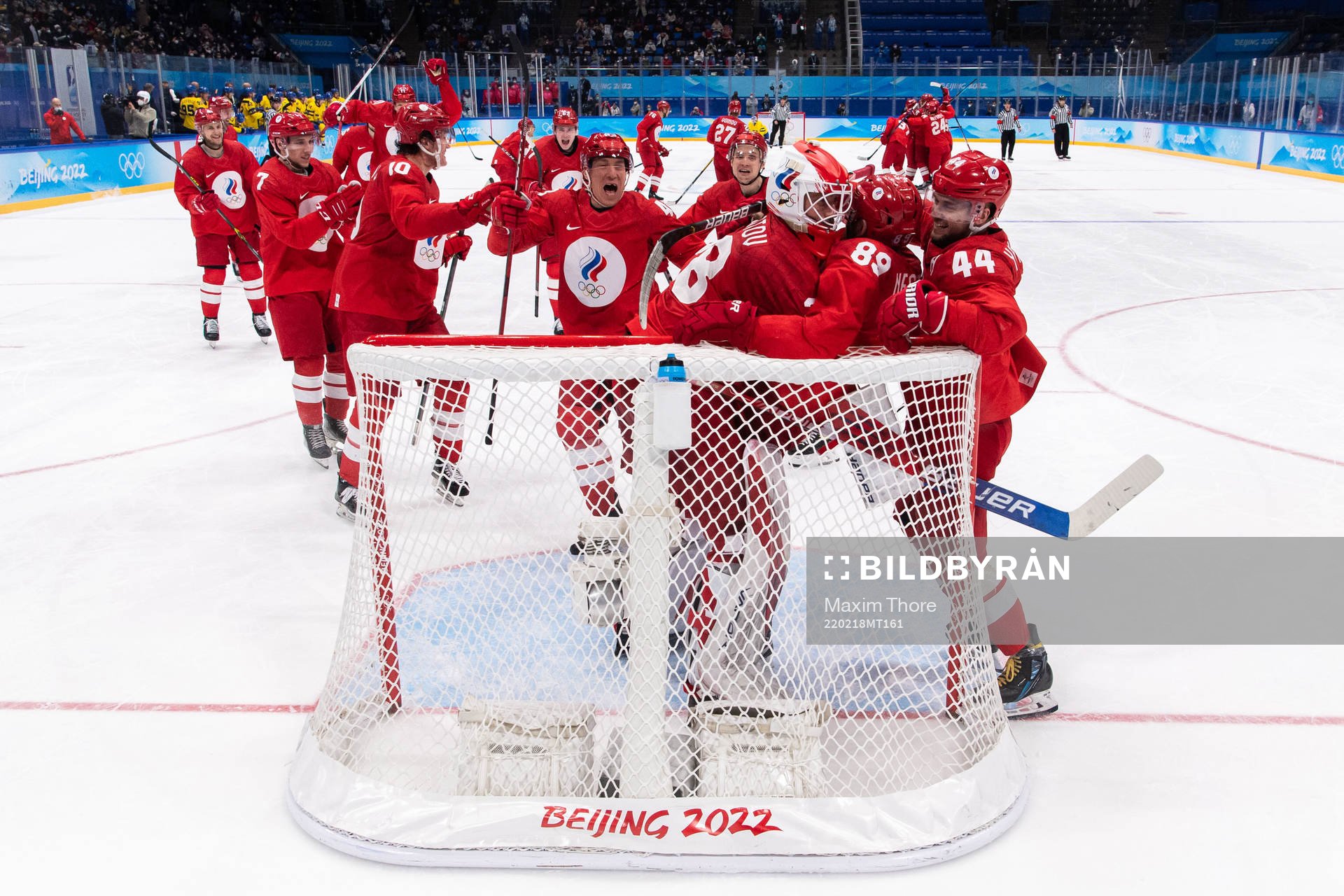 Goaltender Ivan Fedotov of Russia celebrate with teammates