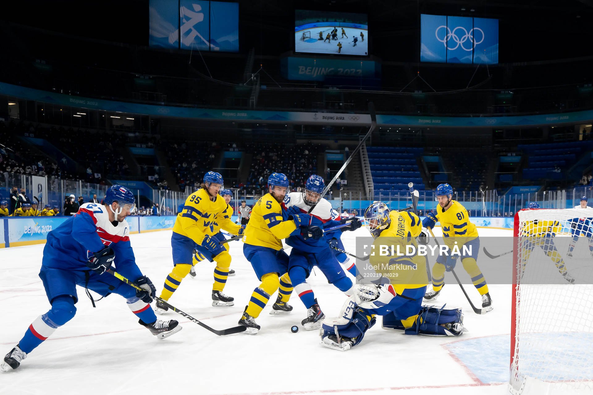 Oscar Fantenberg of Sweden against Juraj Slafkovsky of