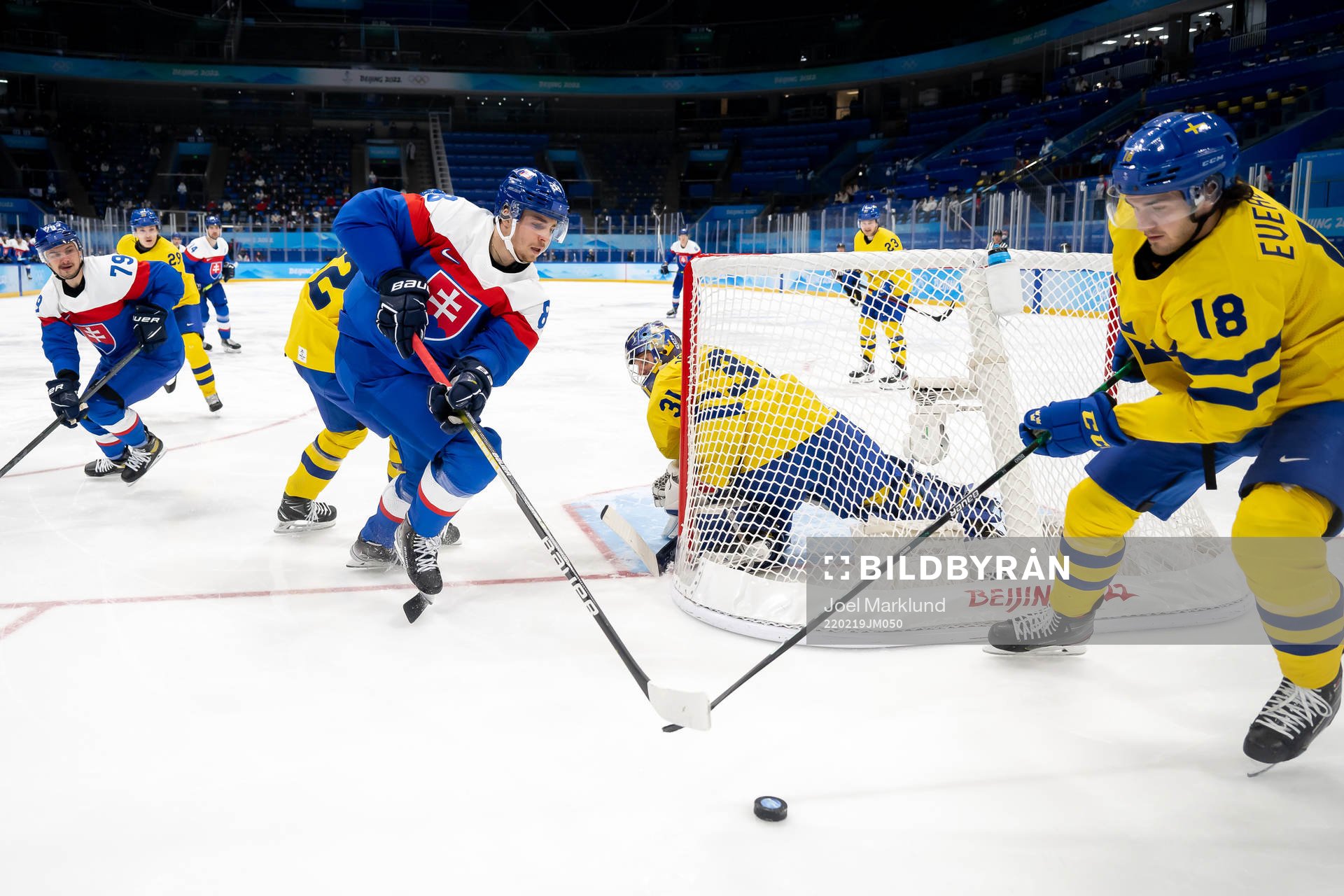 Kristian Pospisil of Slovakia against goaltender Lars