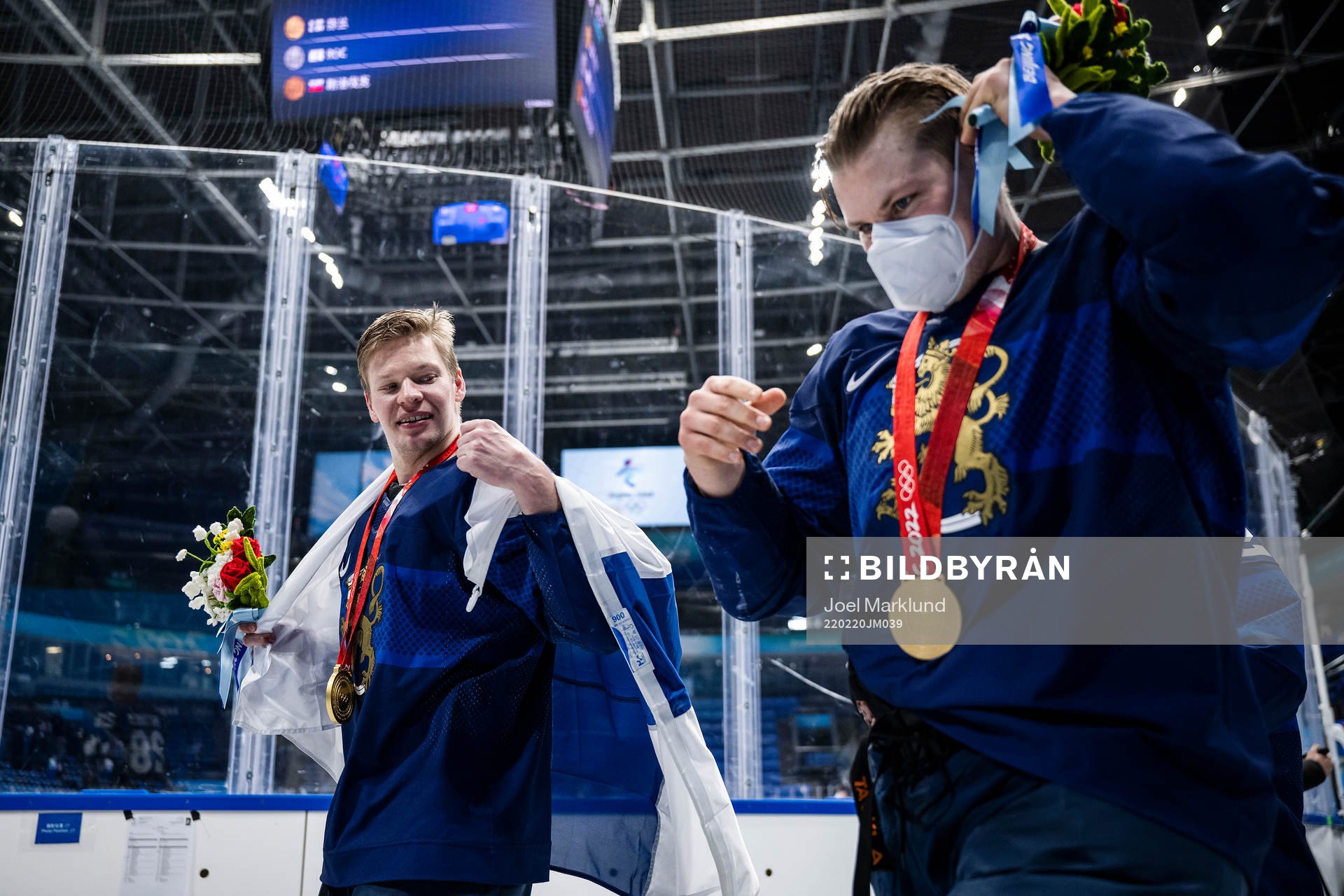 Players of Finland celebrate with their gold medals