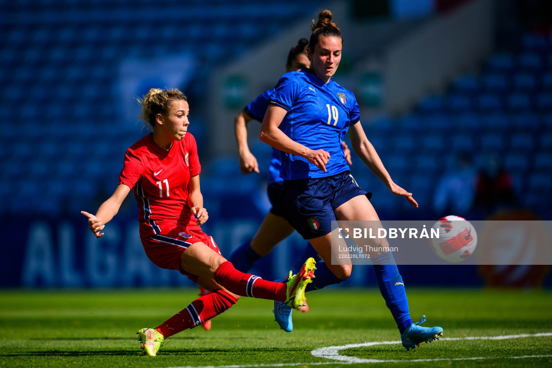 Celin Bizet Ildhusøy of Norway scores 1-2 guarded by