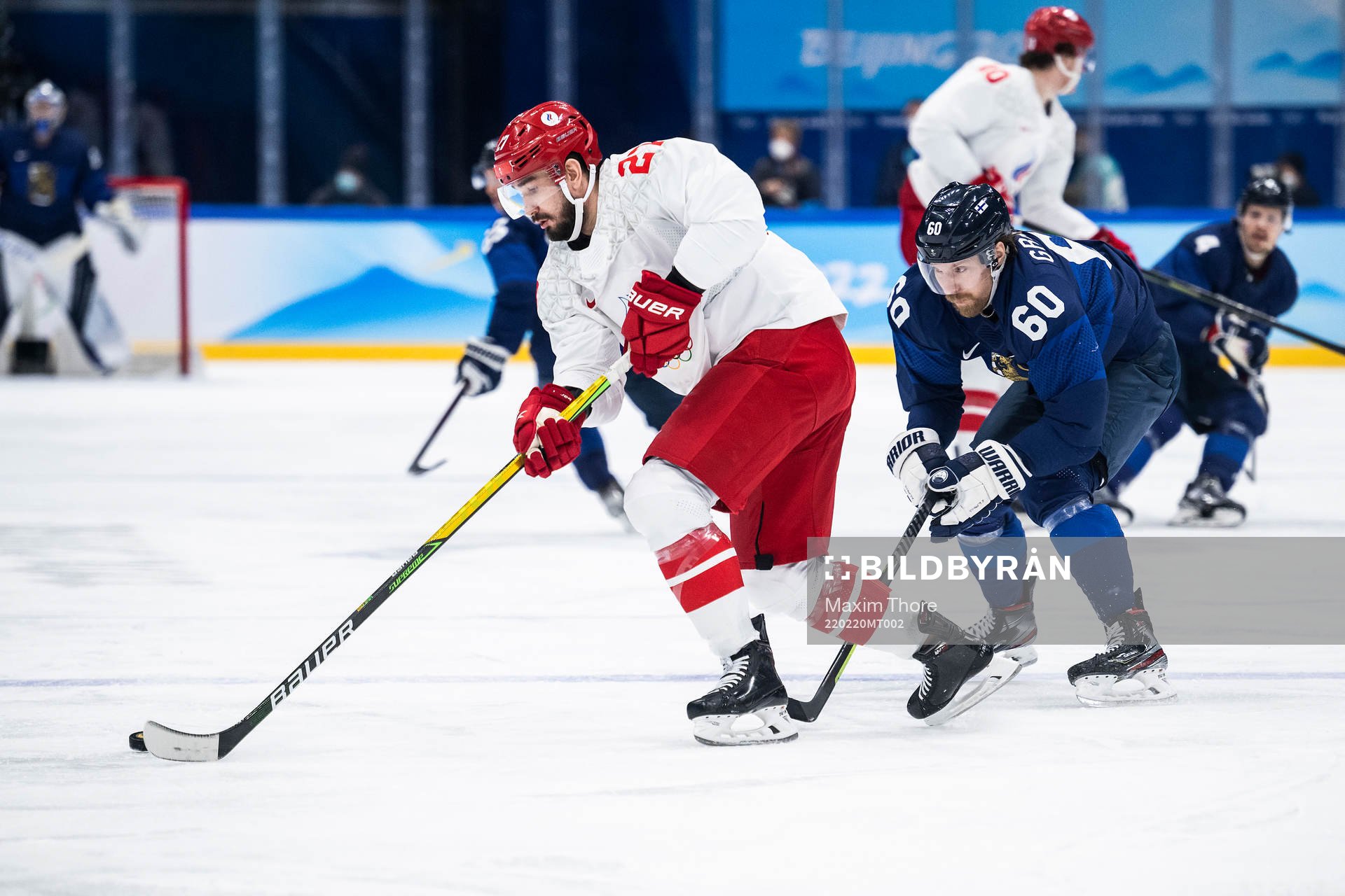 Vyacheslav Voynov of Russia and Markus Granlund of Finland