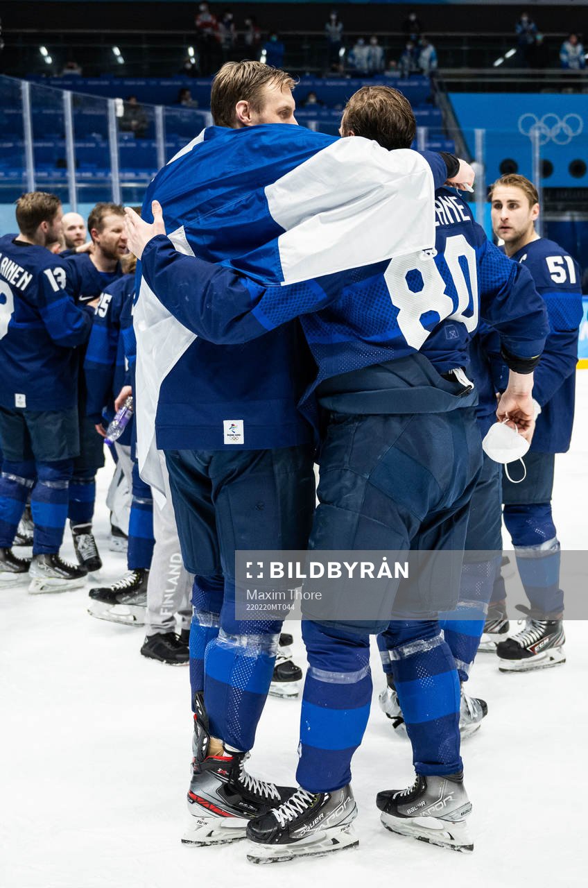 Marko Anttila and Saku Mänalanen of Finland celebrate