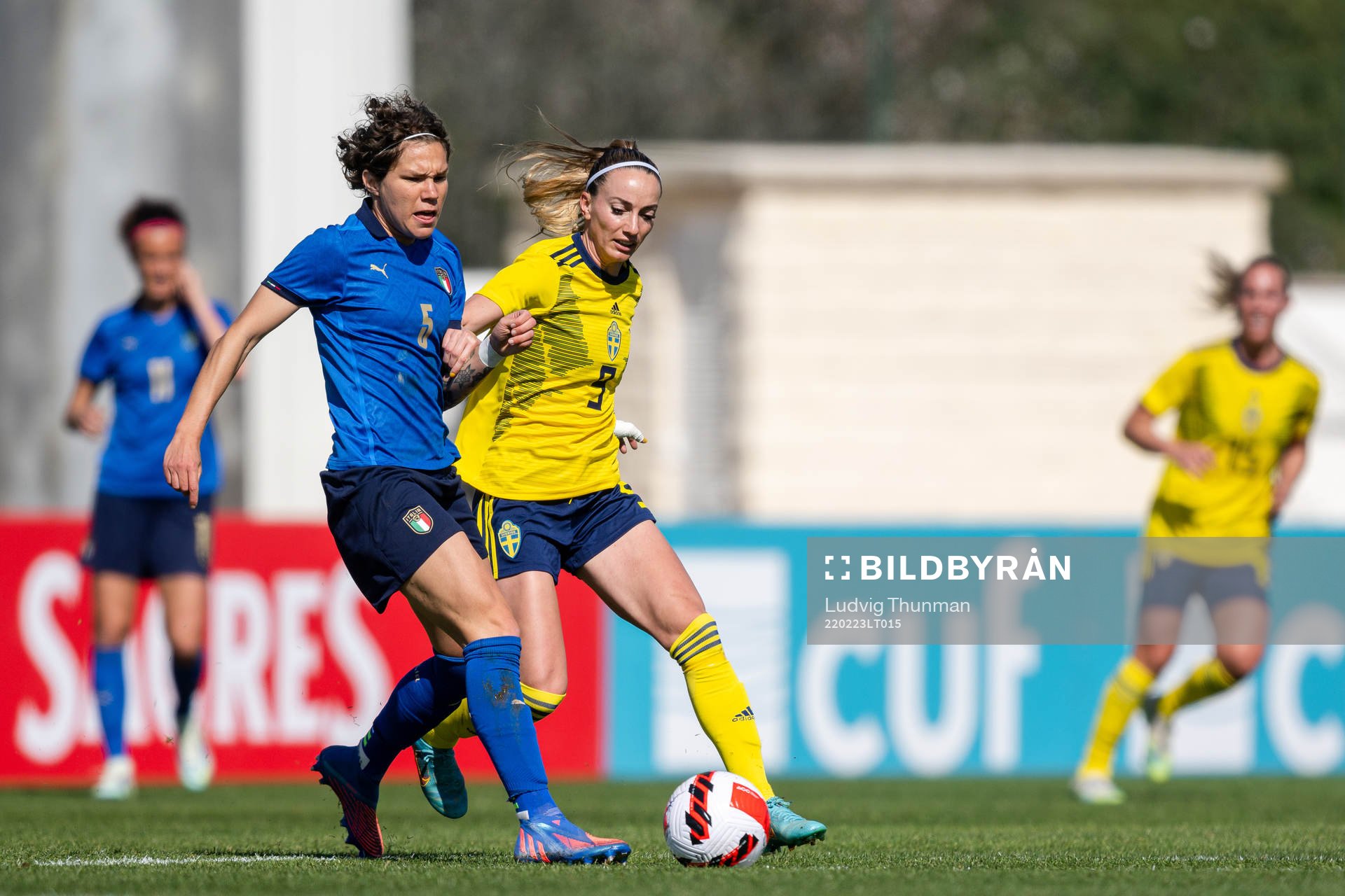 Elena Linari of Italy and Kosovare Asllani of Sweden