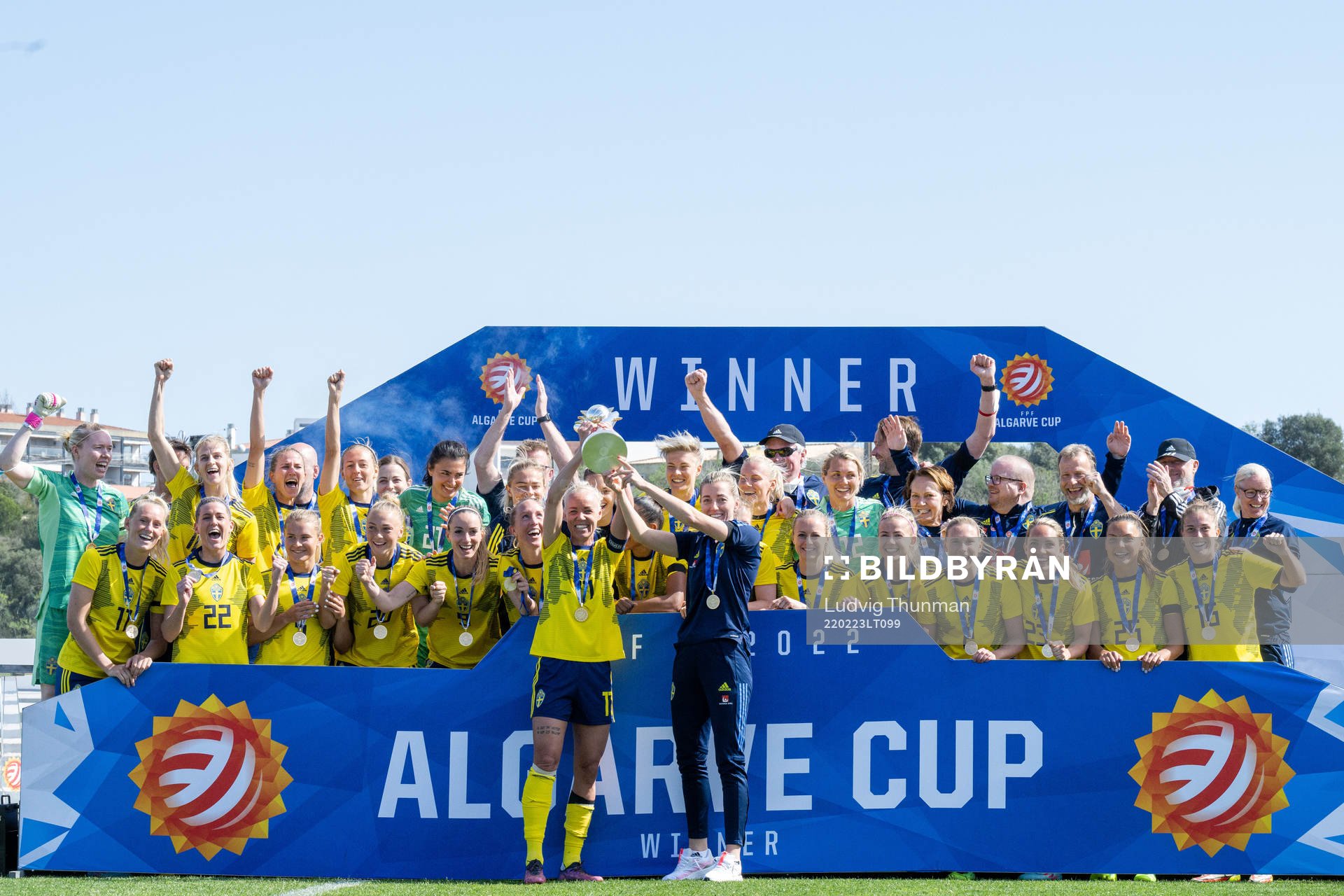 Players of Sweden celebrate with the trophy