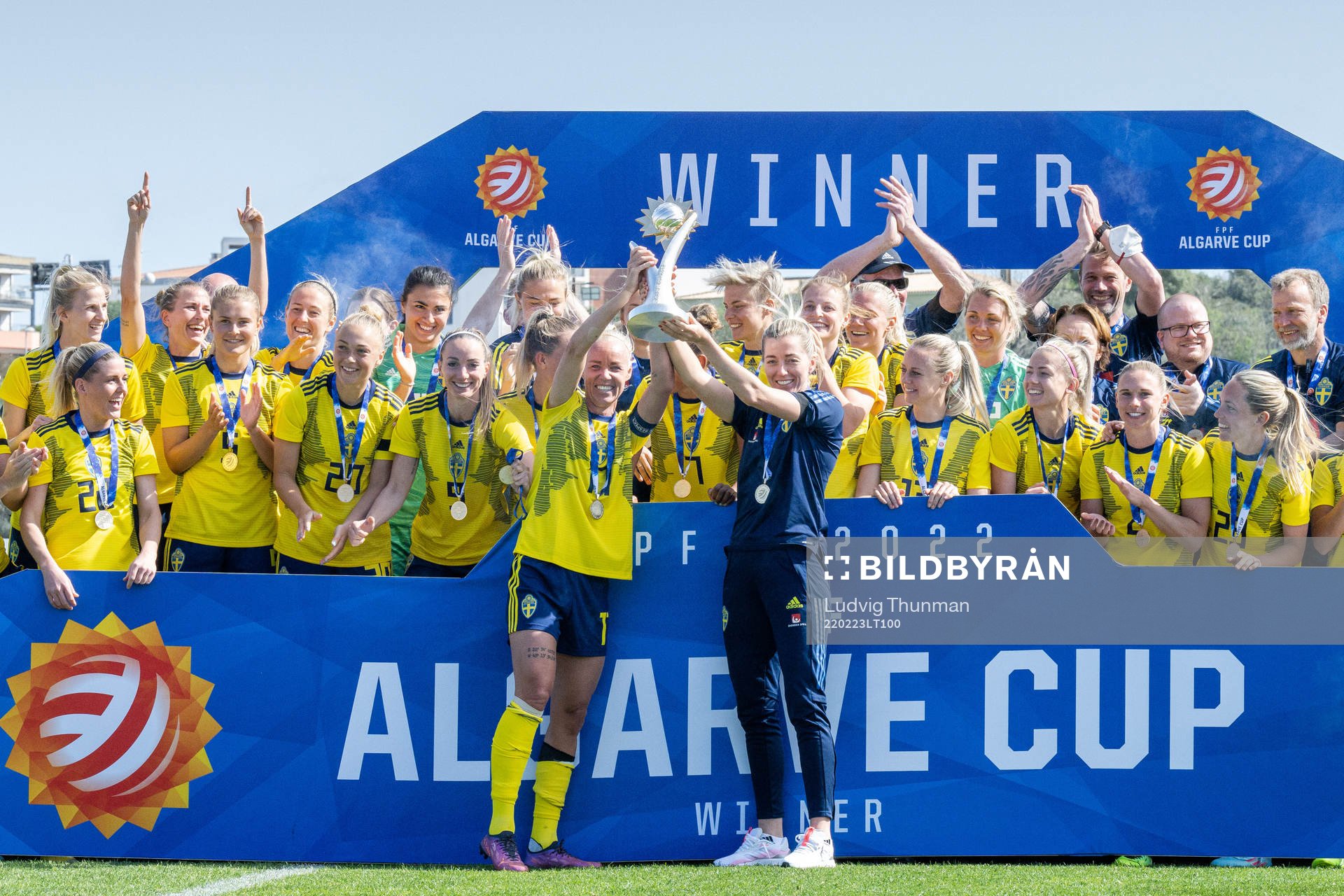 Players of Sweden celebrate with the trophy