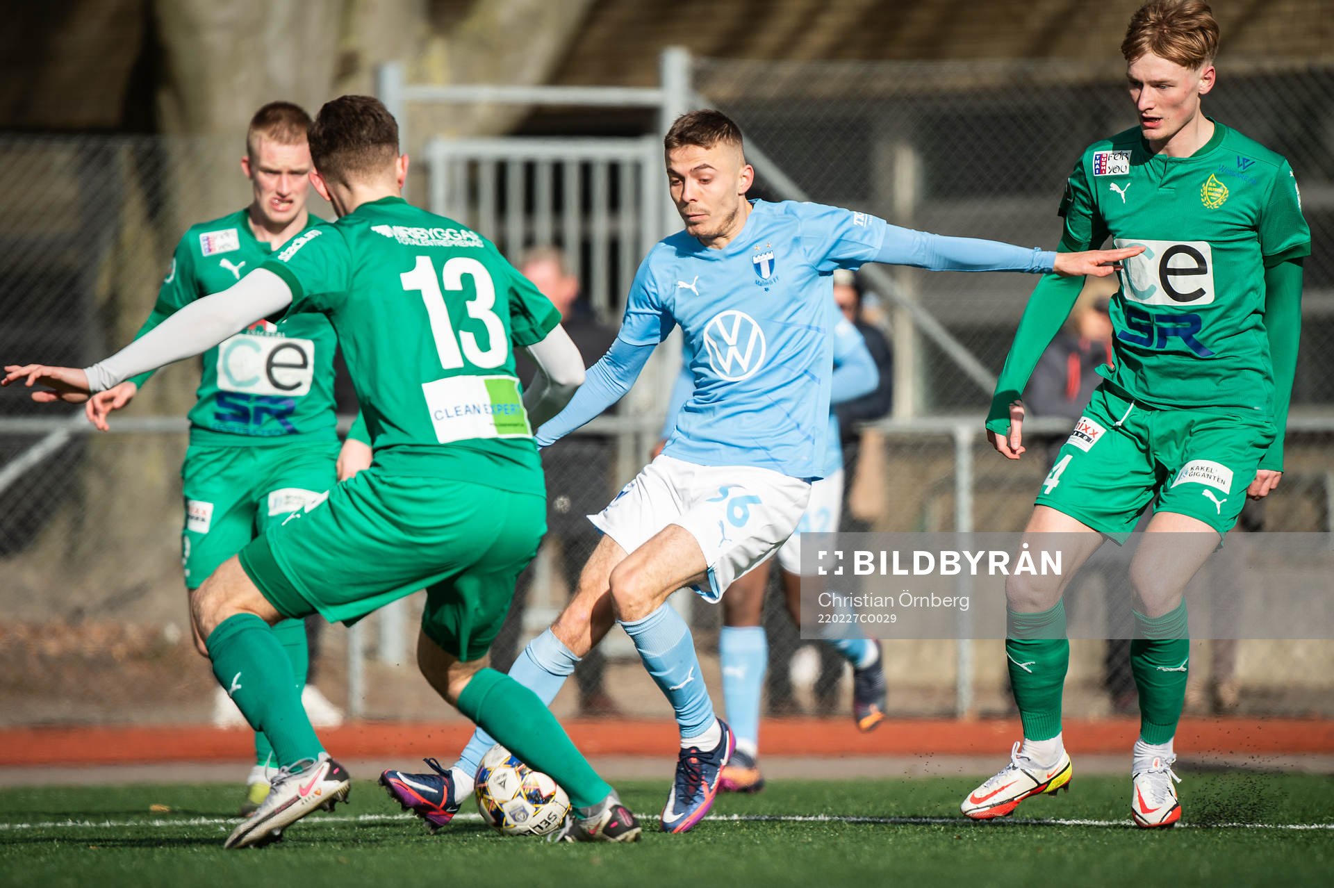 Malmö FFs Patriot Sejdiu mot BK Olympics Lorik Konjuhi och Albin Sjöstrand Bjurnemark under en U21 träningsmatch mellan Malmö FF och BK Olympic den 27 februari 2022 i Malmö.