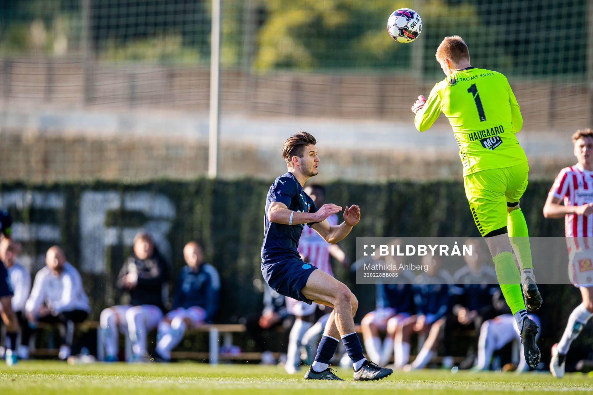 Wilhelm Loeper of Helsingborg and goalkeeper Jakob Haugaard