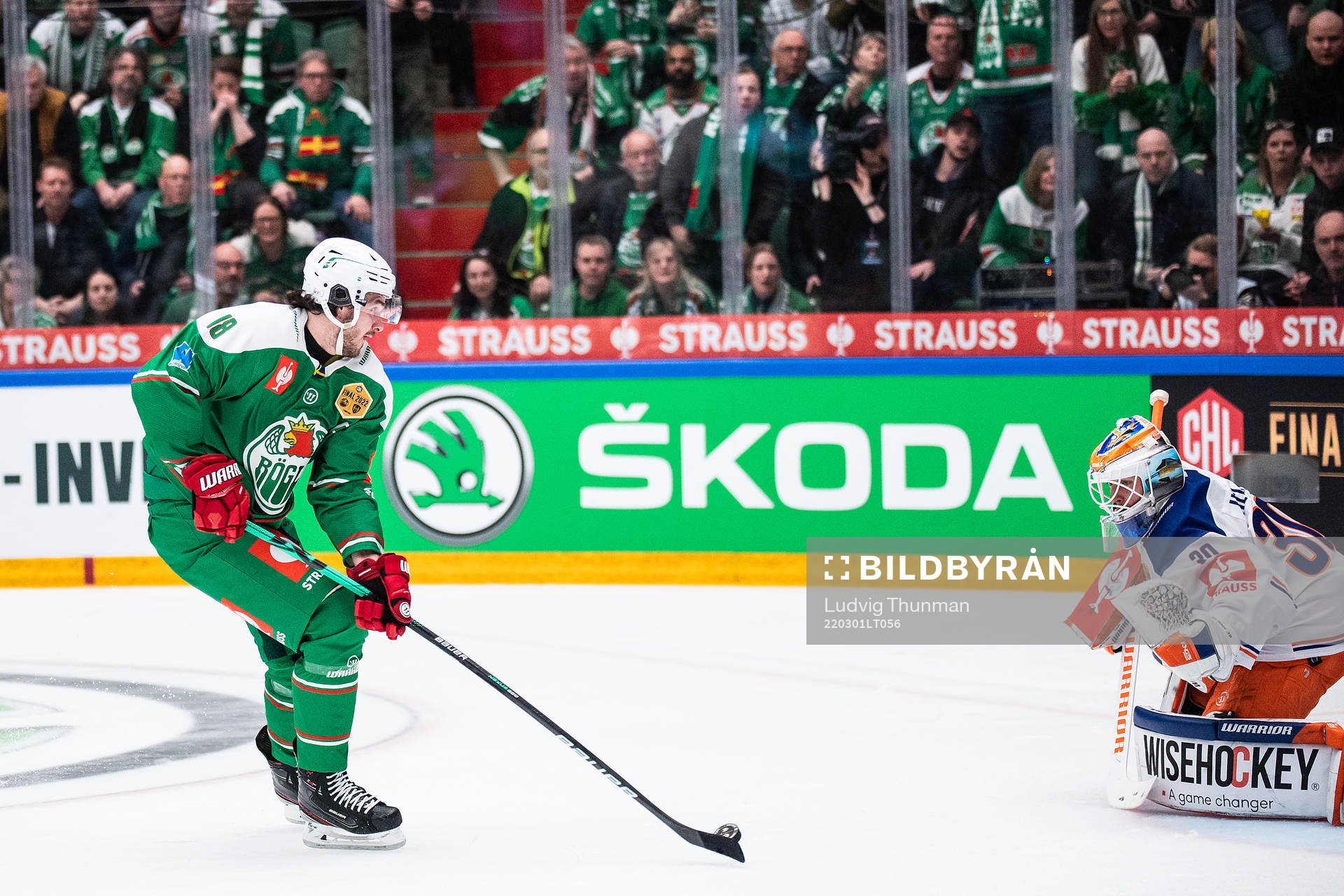 Dennis Everberg of Rögle and goalkeeper Christian Heljanko