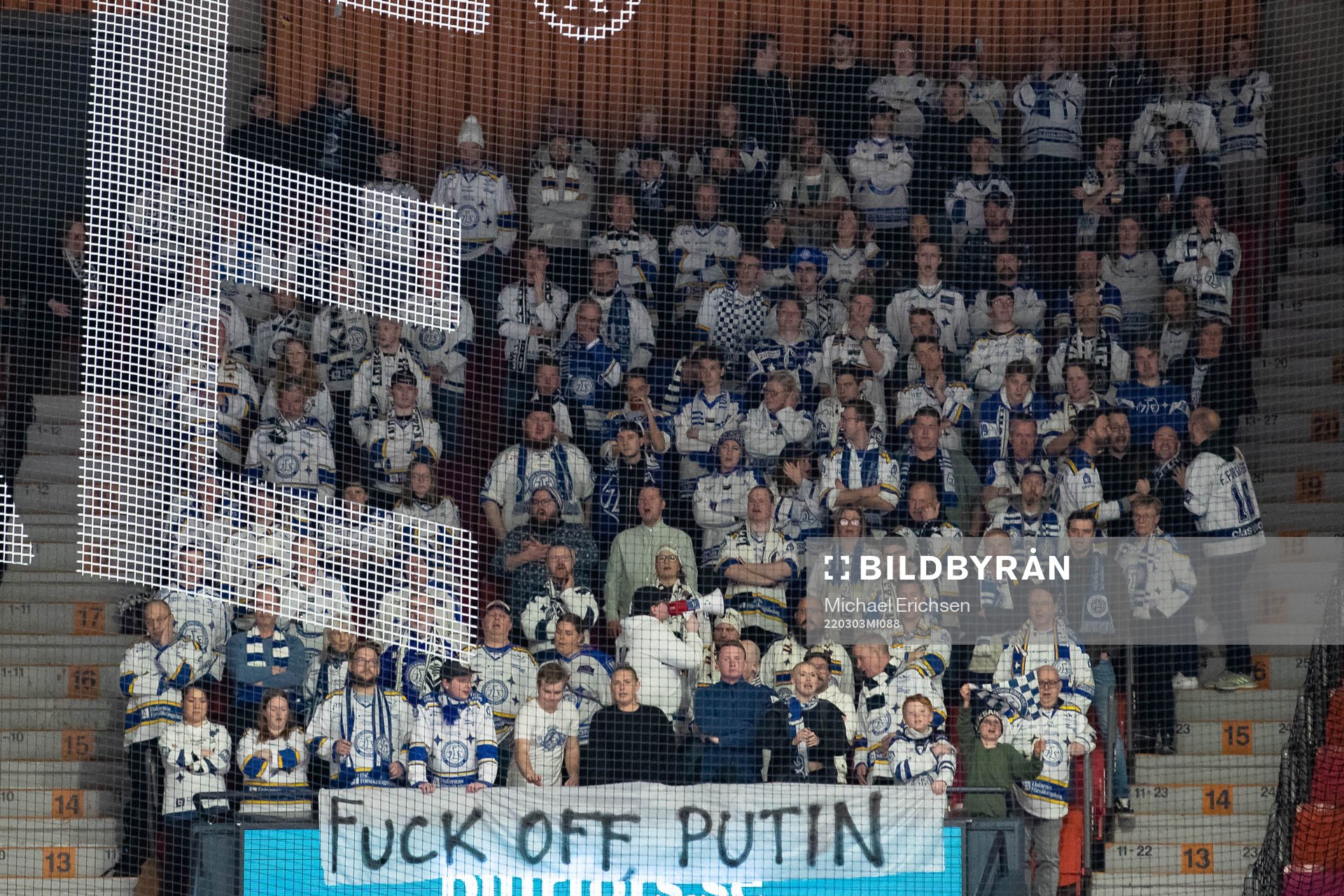 Fans of Leksand hold a banner saying Fuck off Putin as a