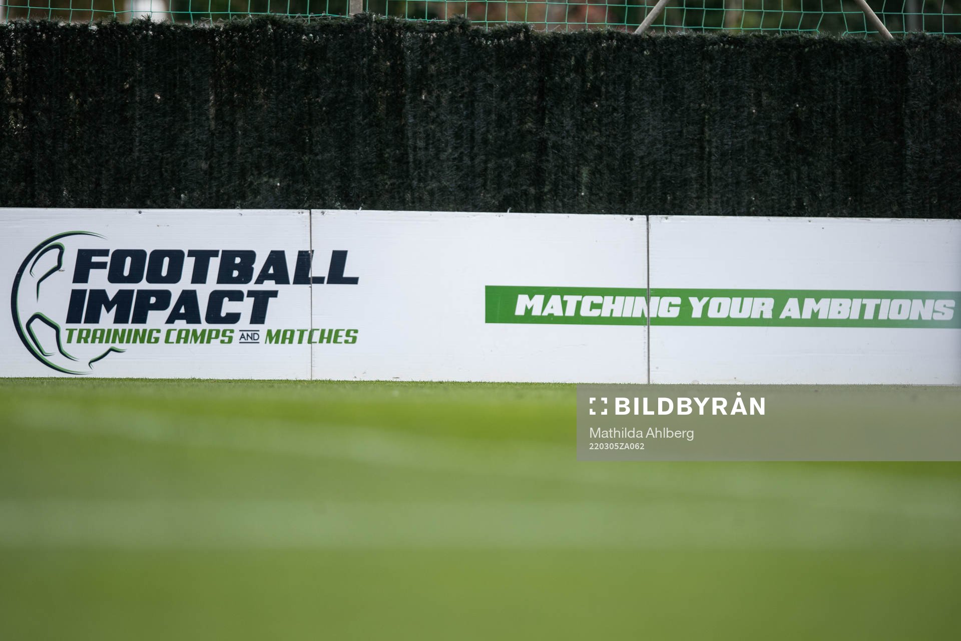 A sign with the logo of Football impact