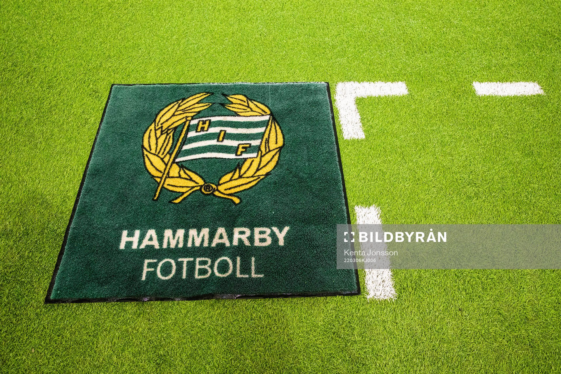En matta med Hammarbys logotyp