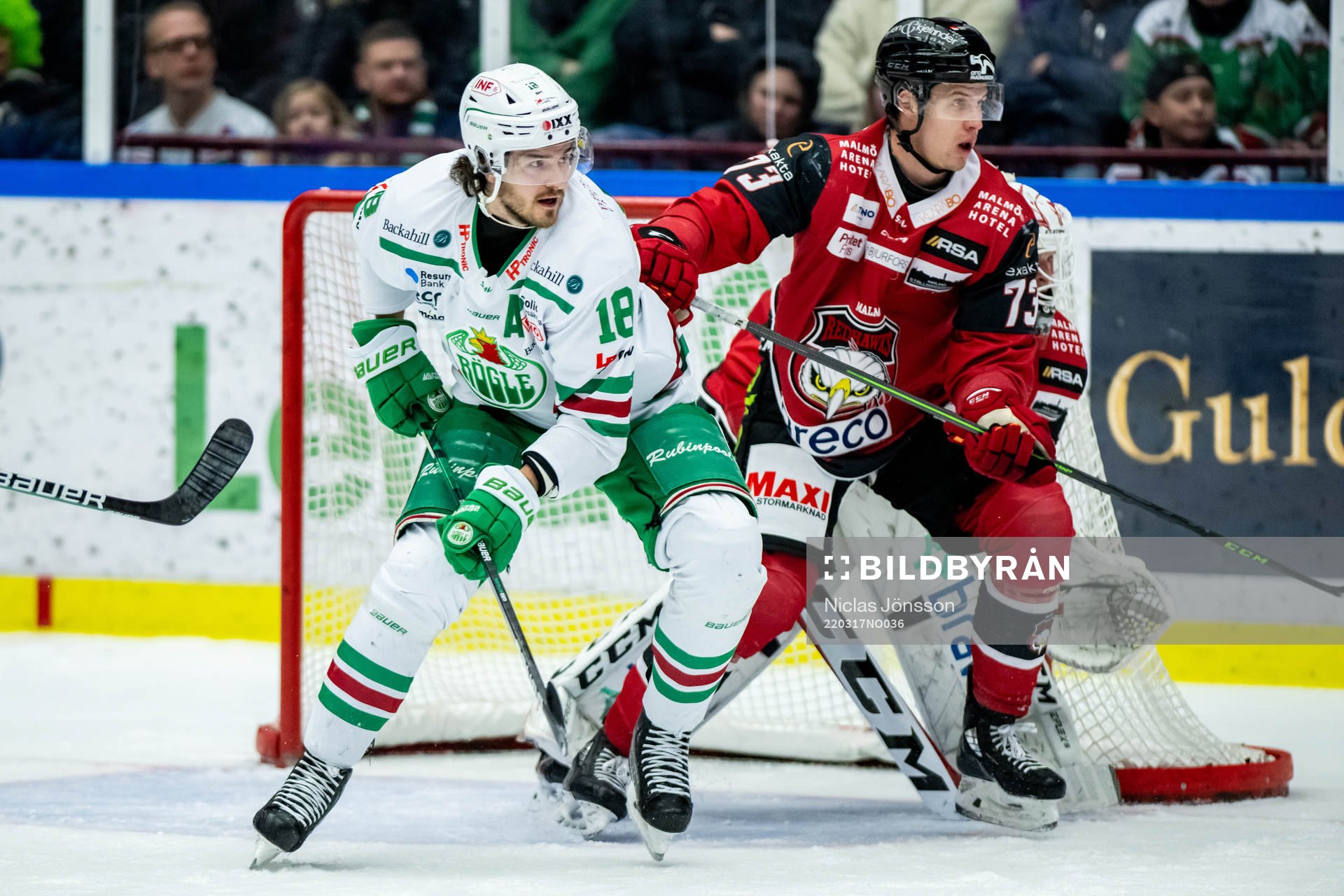 Rögles Dennis Everberg och Malmö Redhawks Adam Ollas