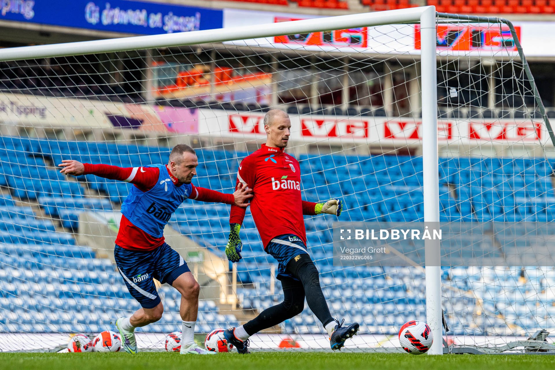 Veton Berisha and goalkeeper André Hansen of the Norwegian