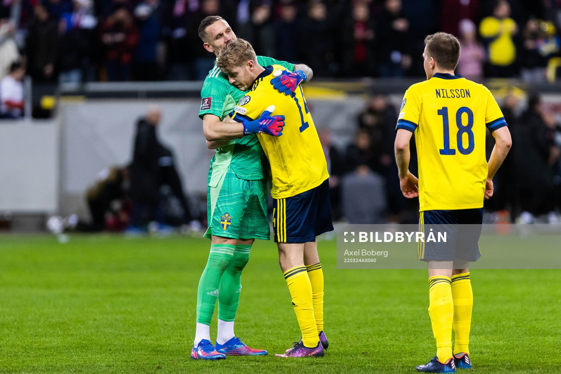 Filip Helander and goalkeeper Robin Olsen of Sweden celebrate after the FIFA World Cup Qualifier play-off semifinal between Sweden and Czech Republic on March 24, 2022 in Stockholm.
