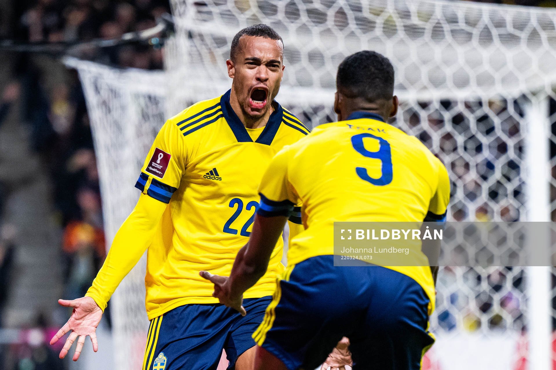 Robin Quaison celebrates with Alexander Isak of Sweden