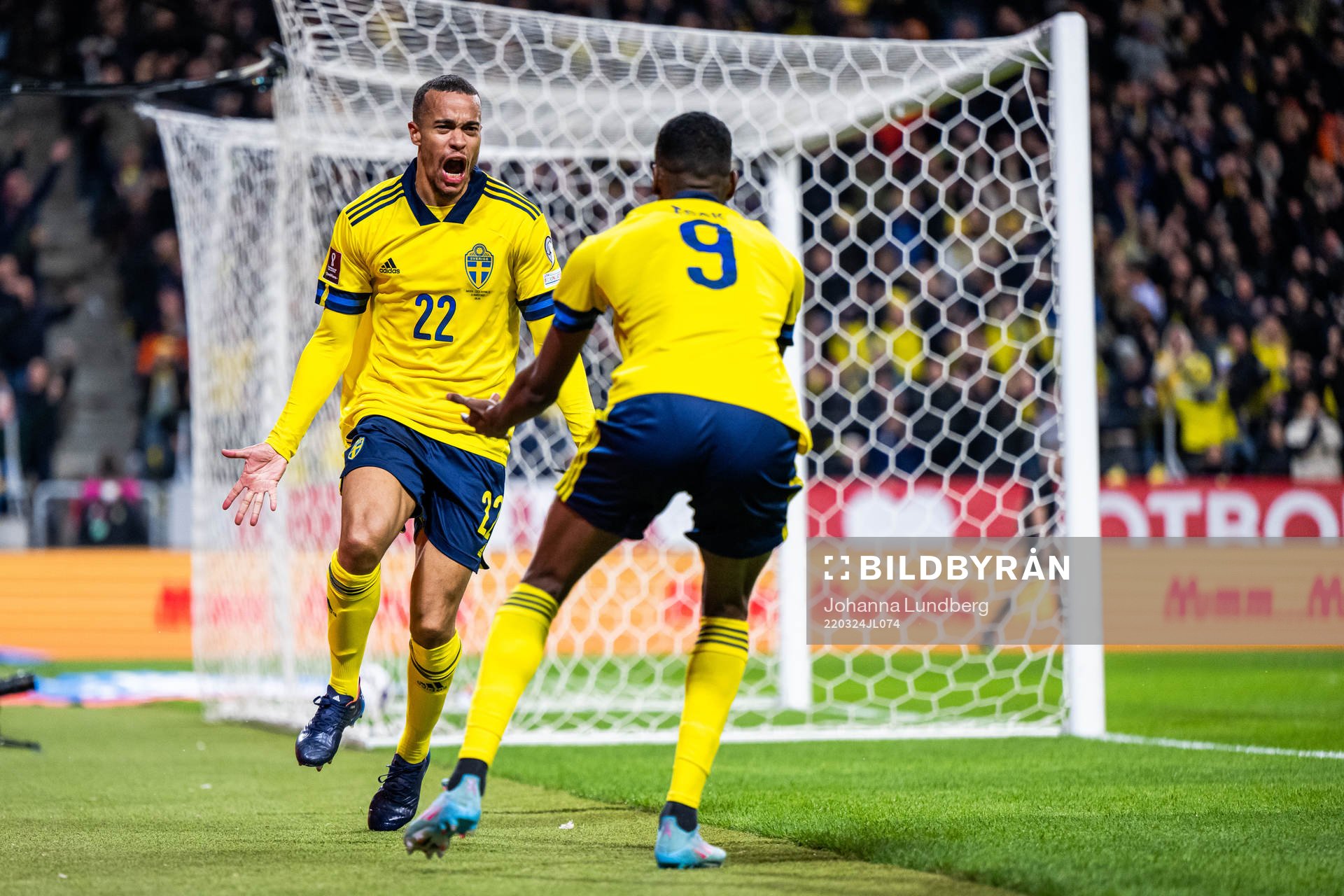 Robin Quaison celebrates with Alexander Isak of Sweden