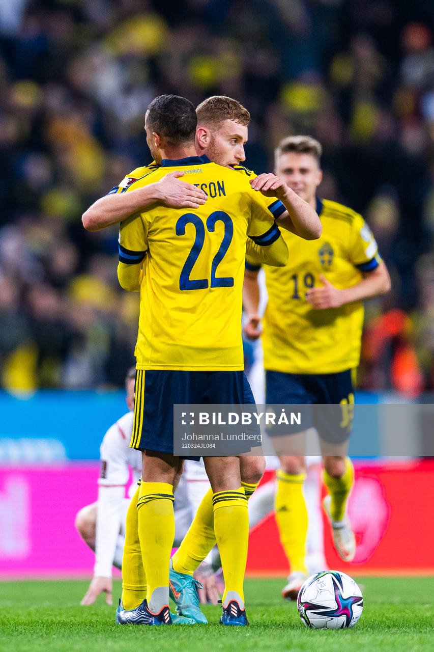 Dejan Kulusevski and Robin Quaison of Sweden celebrate