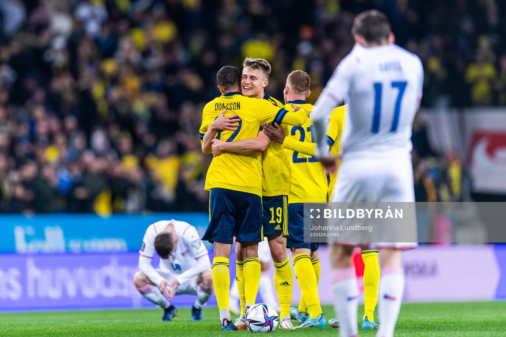 Mattias Svanberg and Robin Quaison of Sweden celebrate
