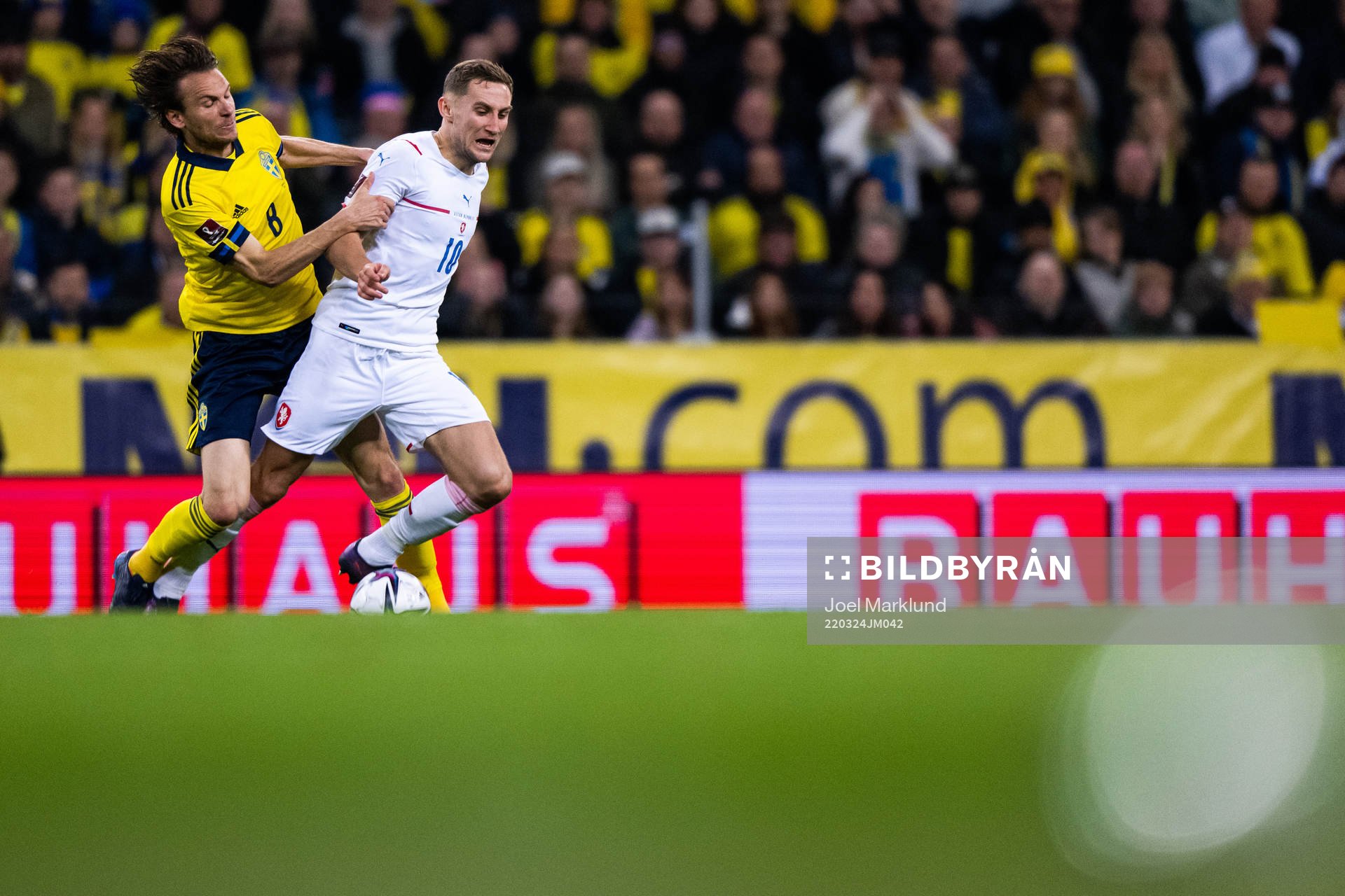 Albin Ekdal of Sweden pulls at Jan Kuchta of Czech Republic