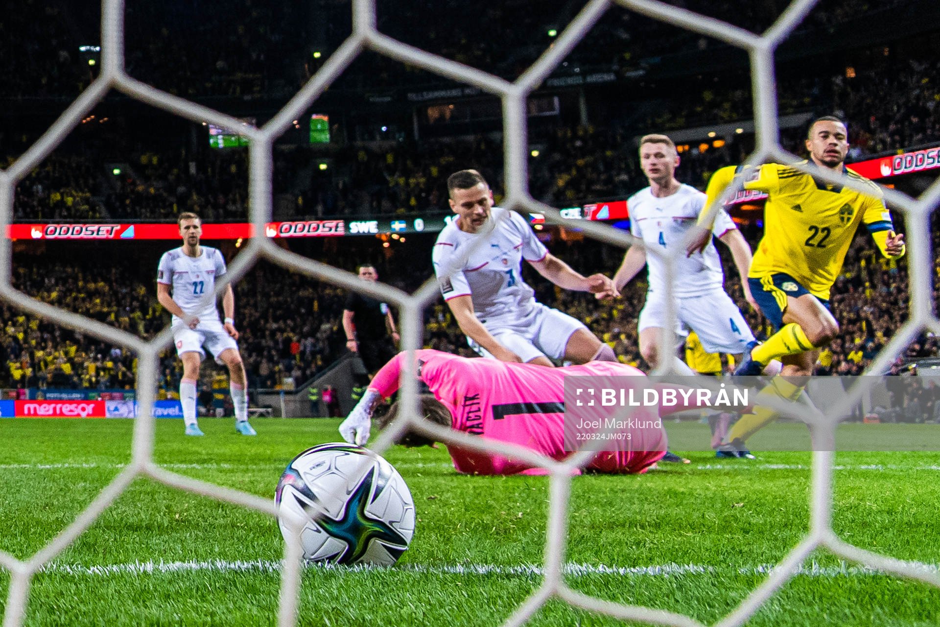 Robin Quaison of Sweden scores 1-0 behind goalkeeper Tomas