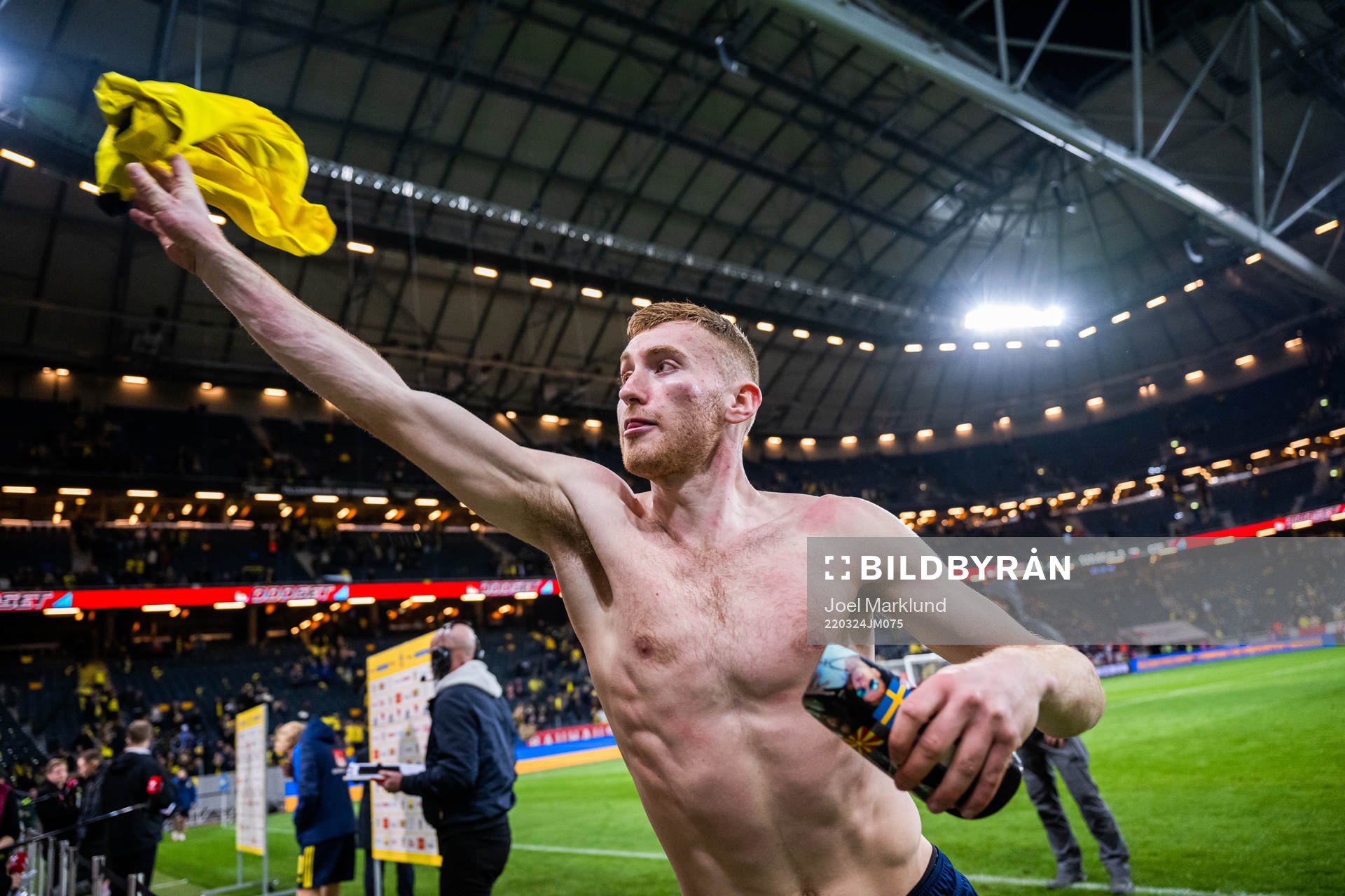 Dejan Kulusevski of Sweden throws his shirt