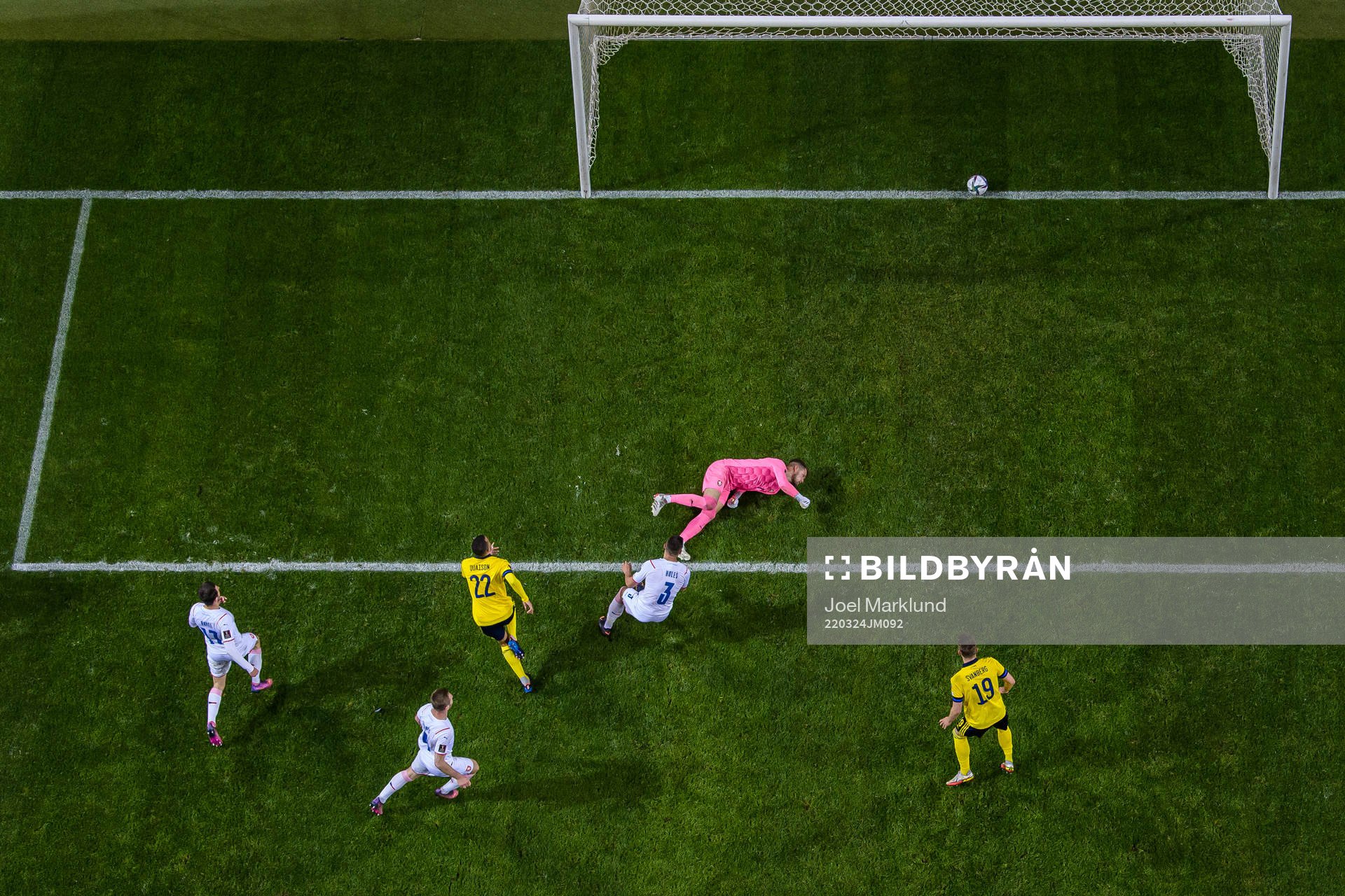 Robin Quaison of Sweden scores the 1-0 goal behind