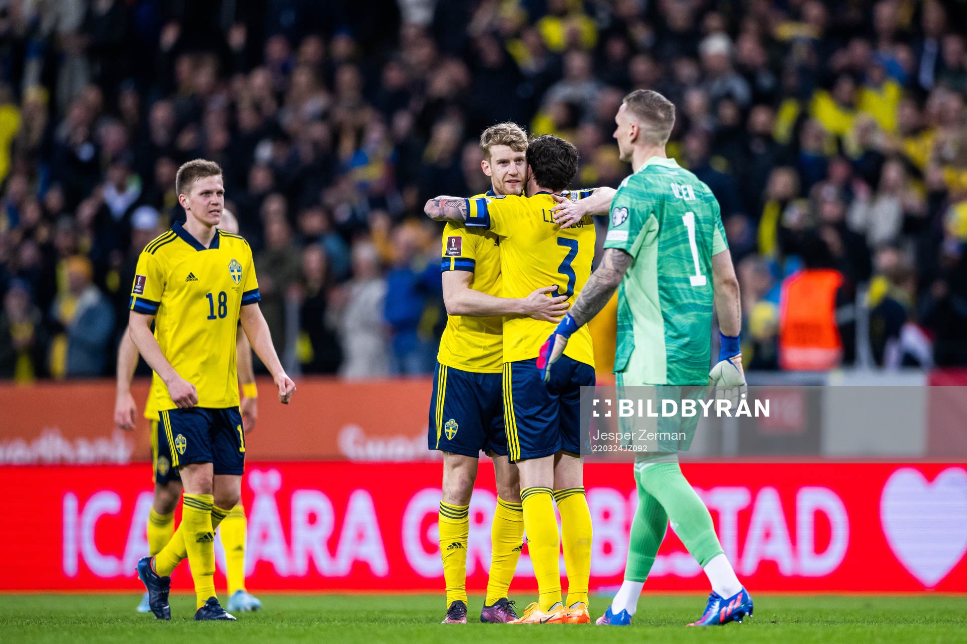 Filip Helander and Victor Lindelöf of Sweden celebrate