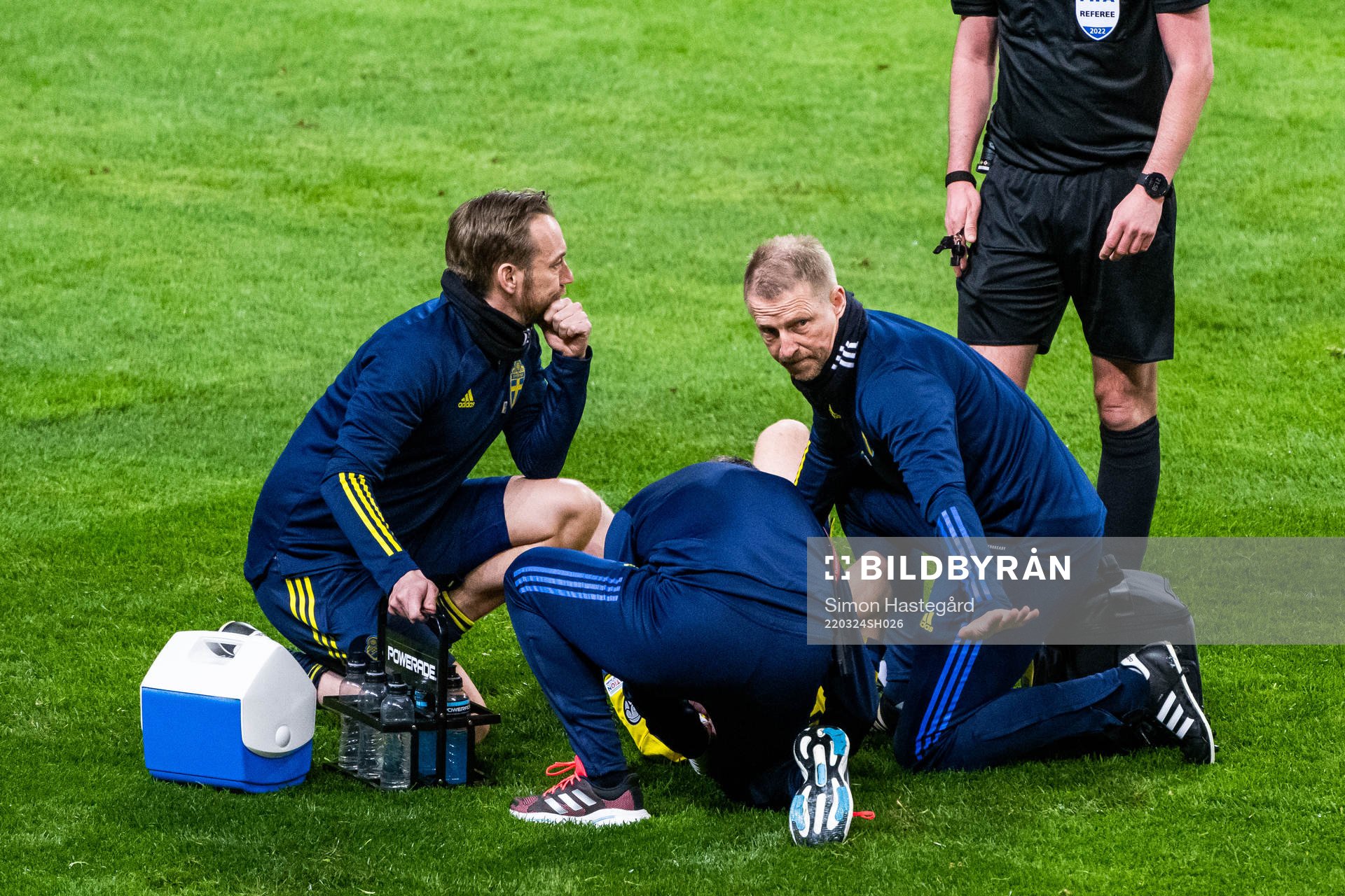 Dejan Kulusevski of Sweden receives medcial attention